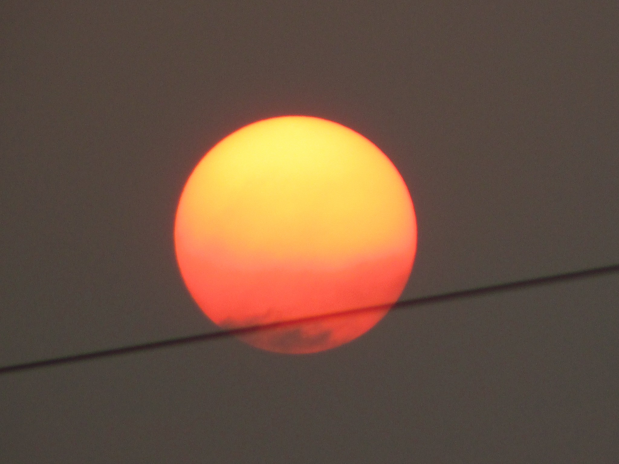 close up big sunset, big orange sun, dramatic sunset, beautiful 