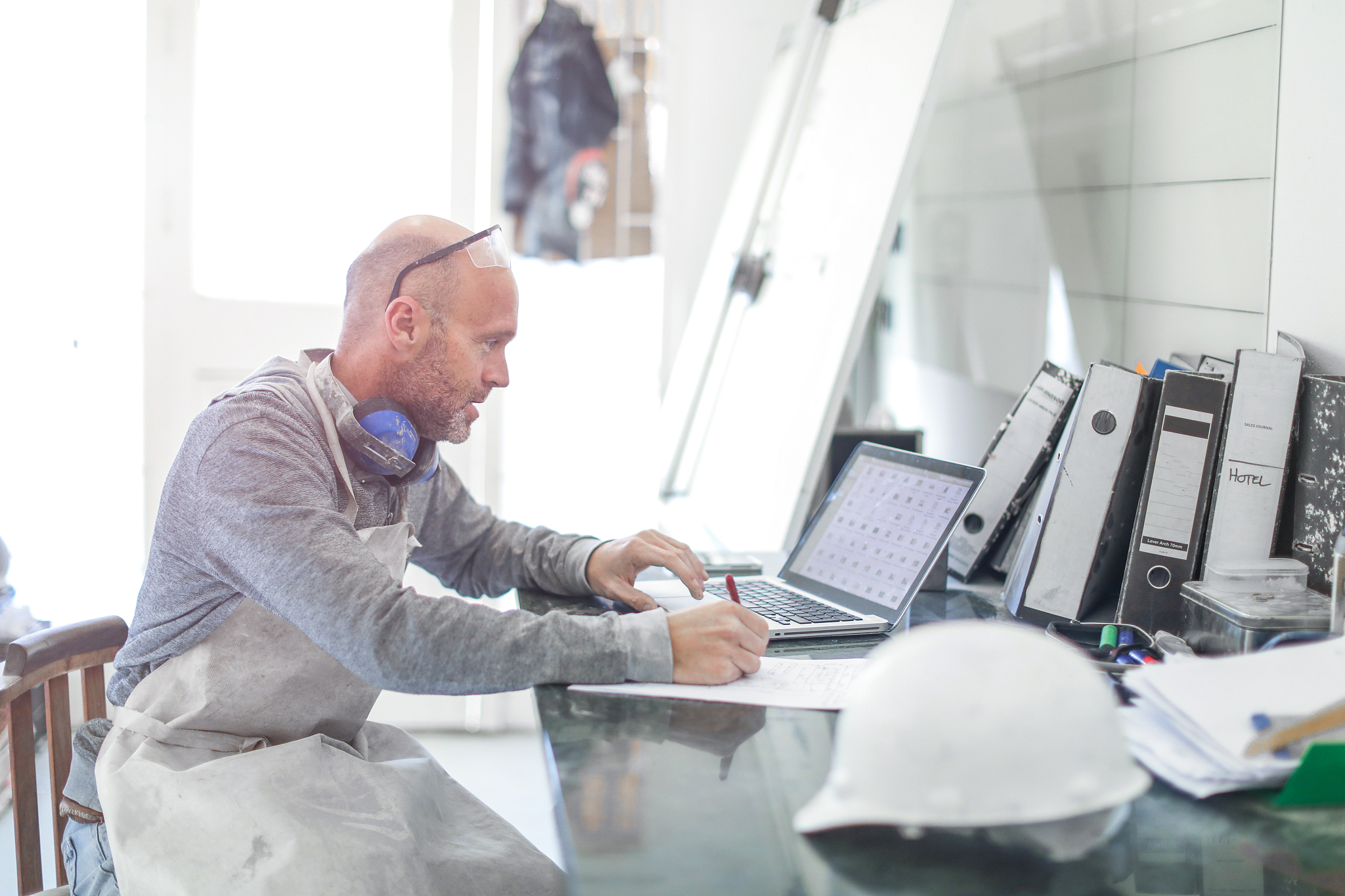 worker planning in his workshop.