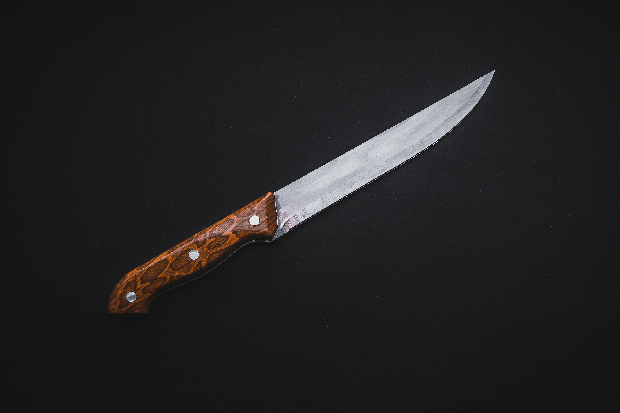 kitchen knife on black background