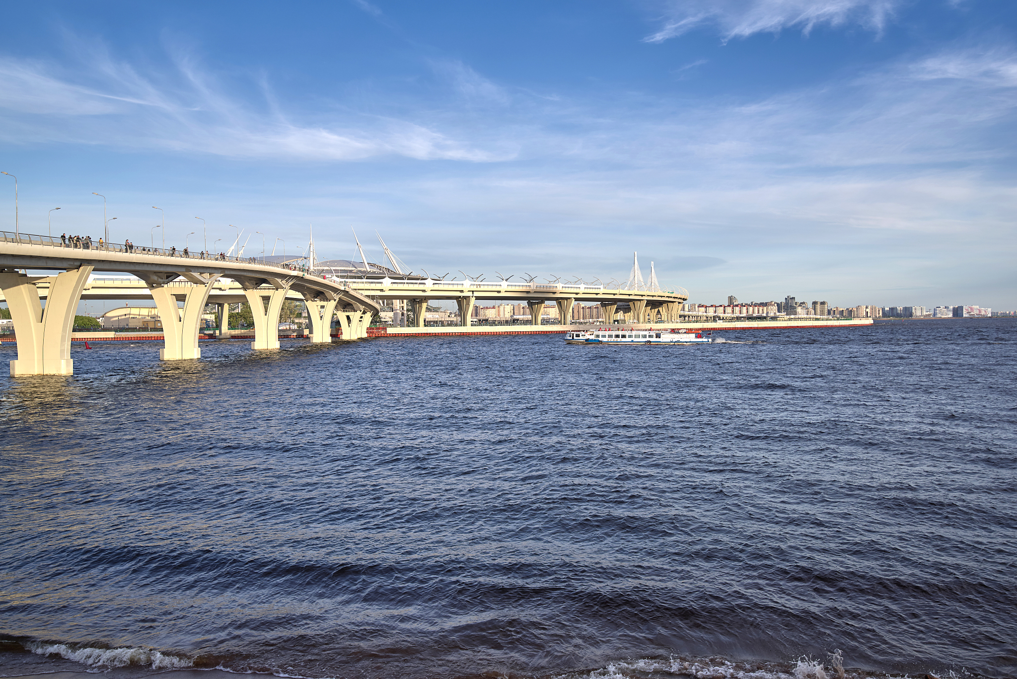 city landscape, view from river to city with motorway