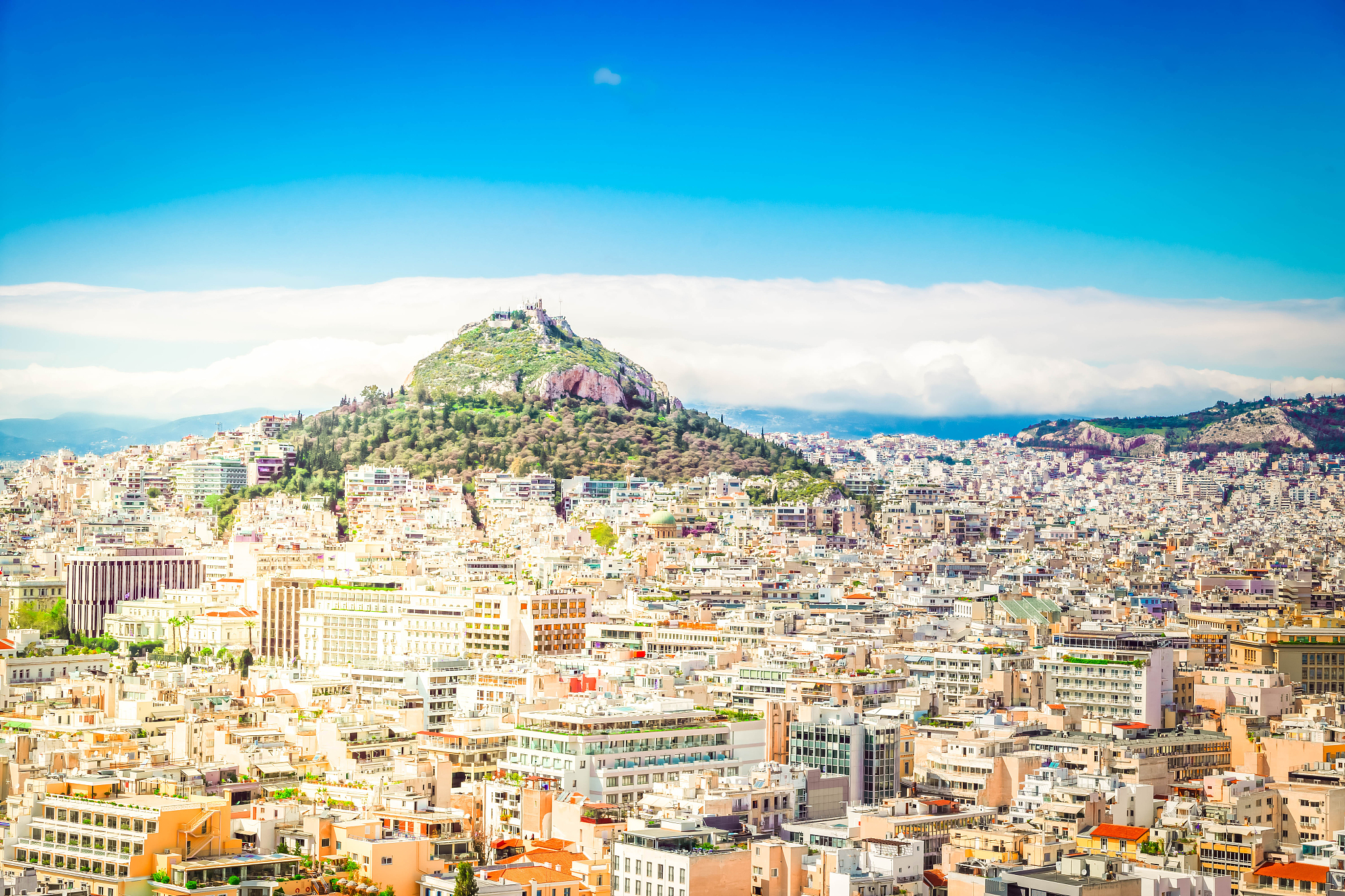 cityscape of athens with lycabettus hill