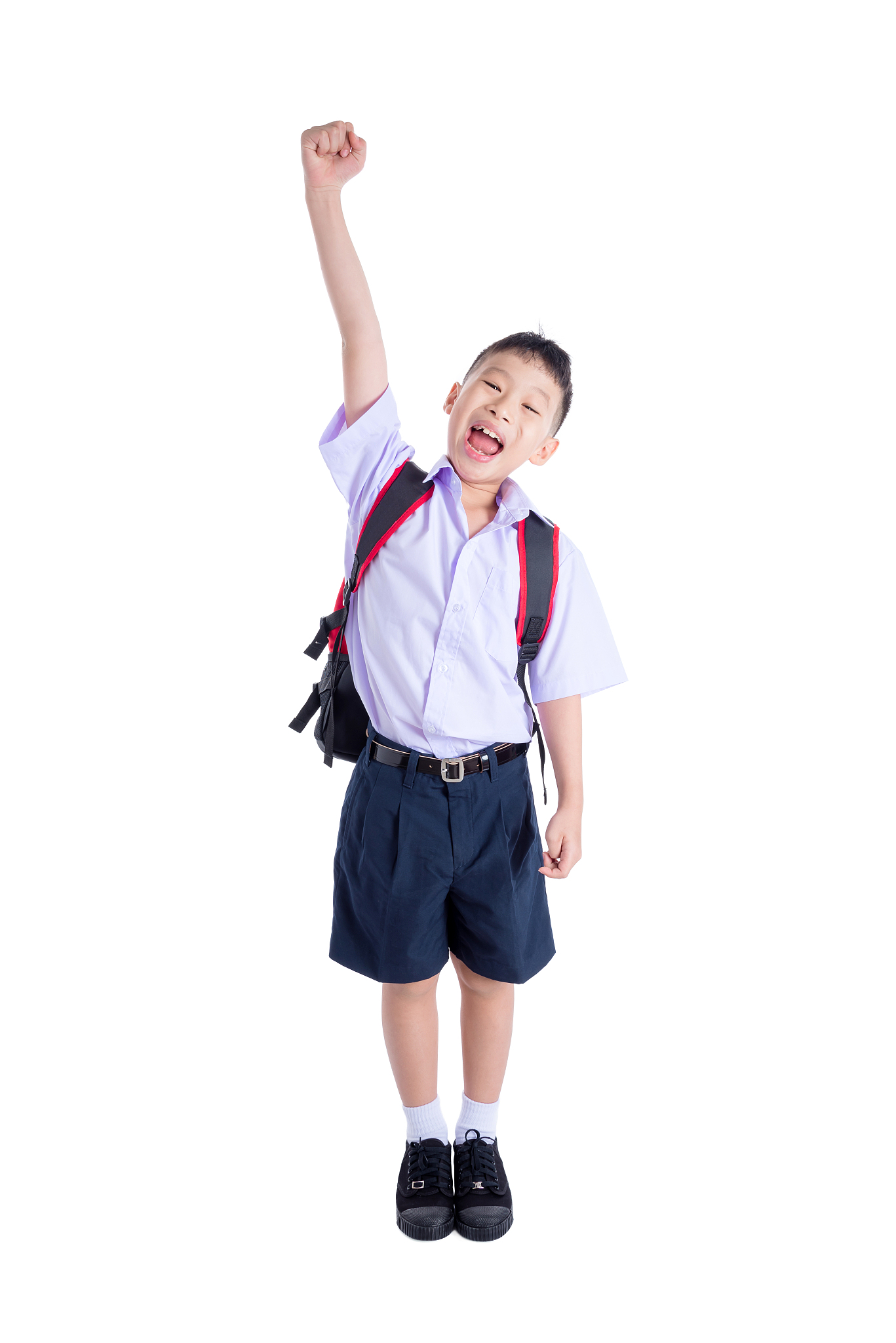 young student in uniform smiling over white