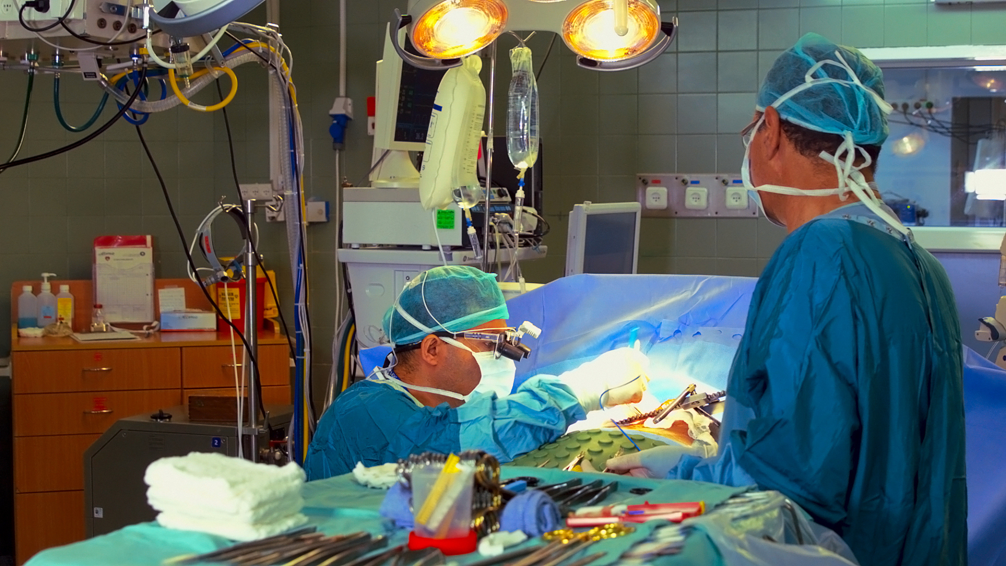 surgeon and his assistant during operation process