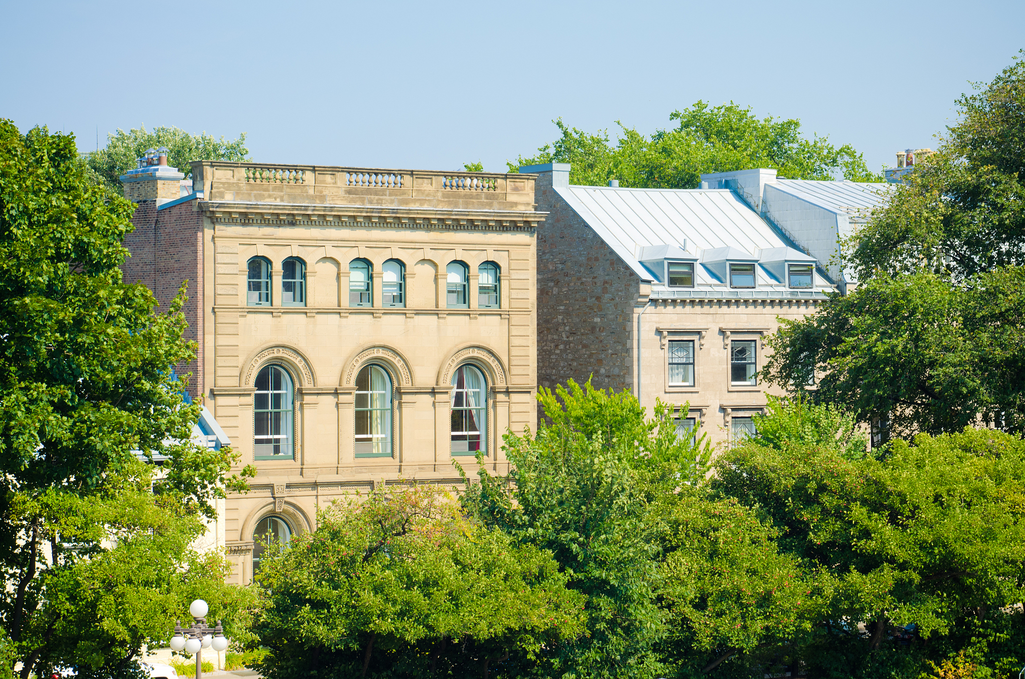 buildings and trees in quebec city, canada
