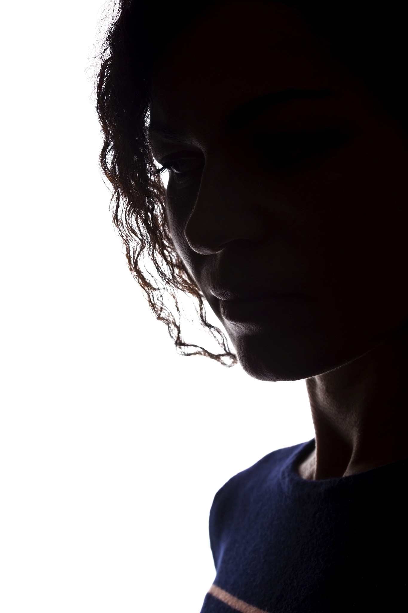 young woman look ahead with flowing hair - silhouette