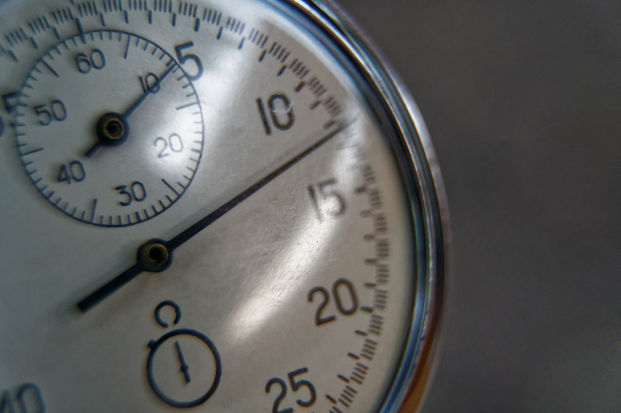 stopwatch lies on bench close-up, time shift concept
