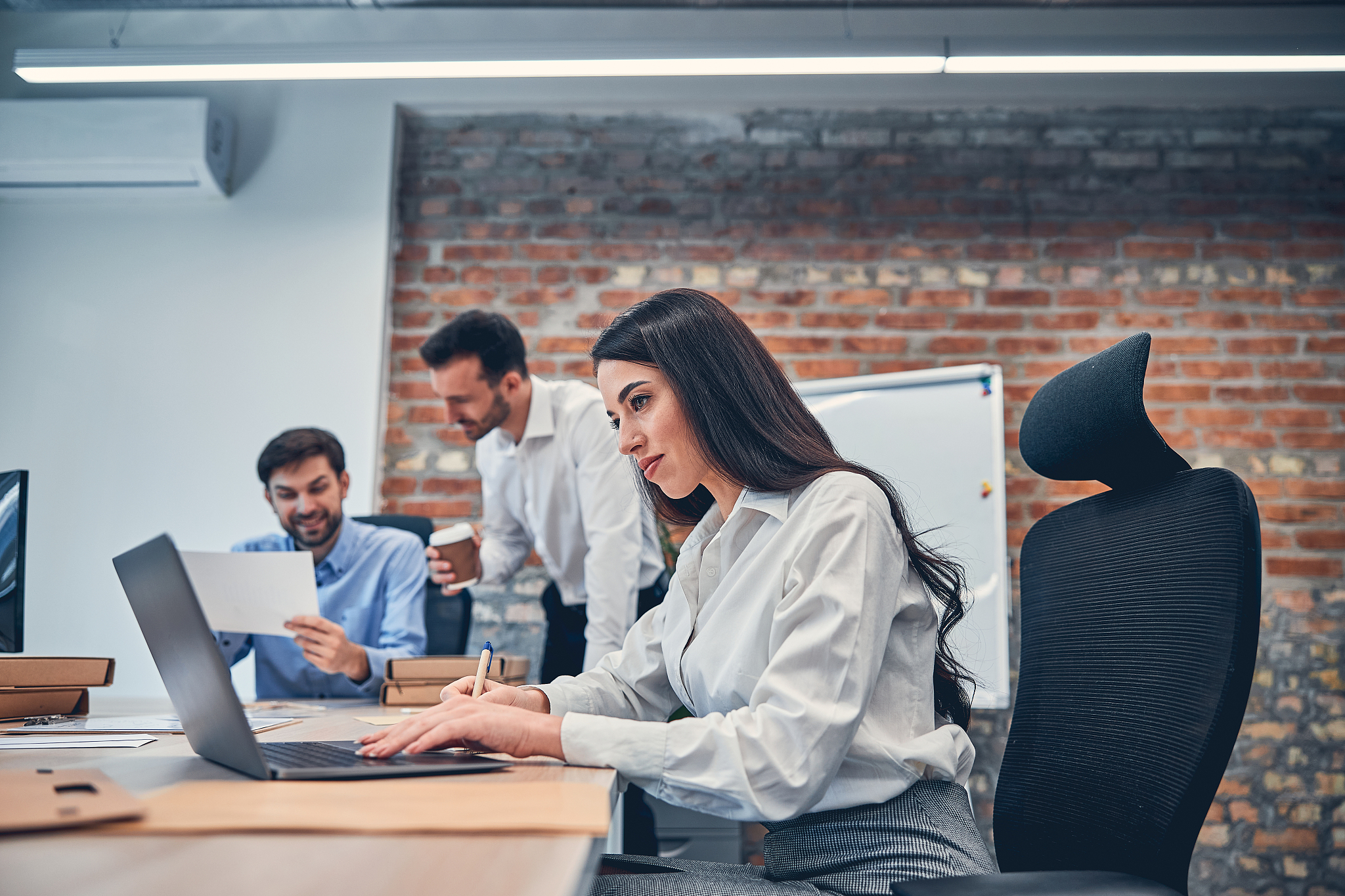young managers staying together in the office