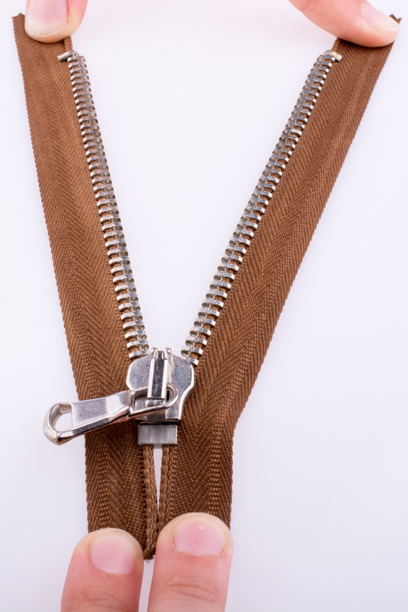 hand holding zipper