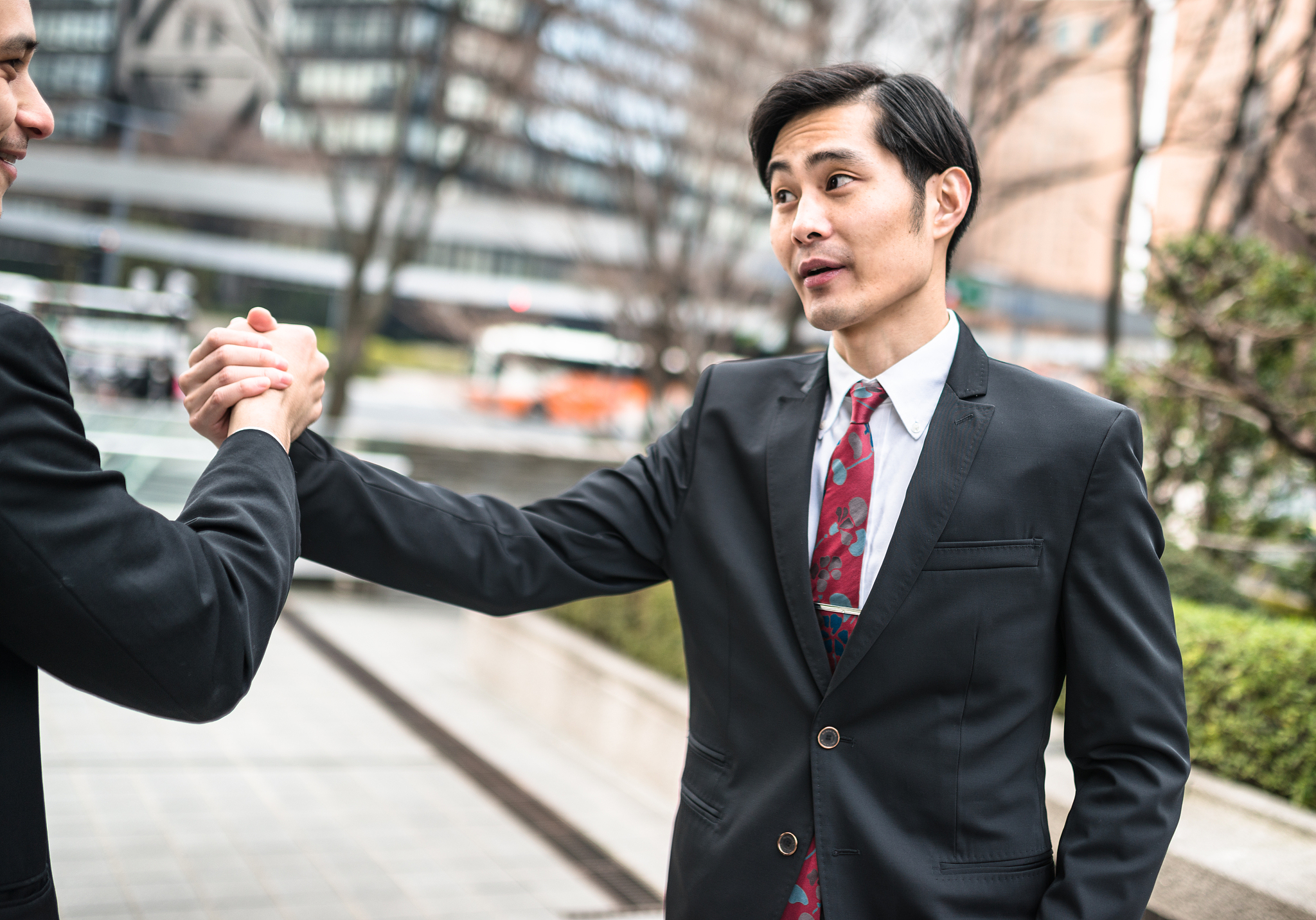 japanese business man having fun togetherness