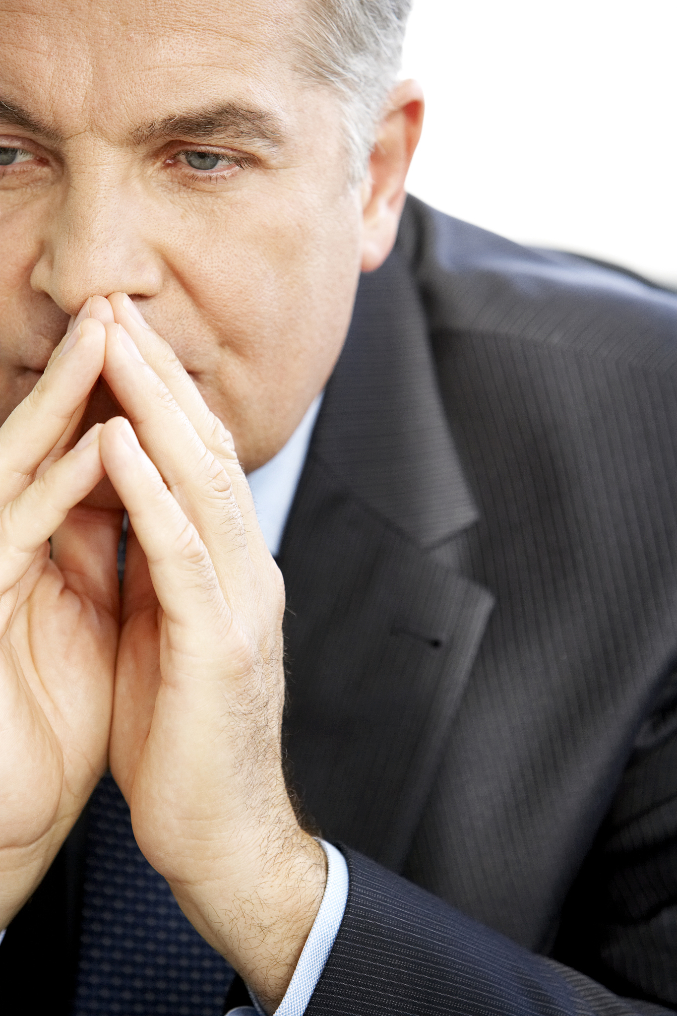 businessman with hands pressed together