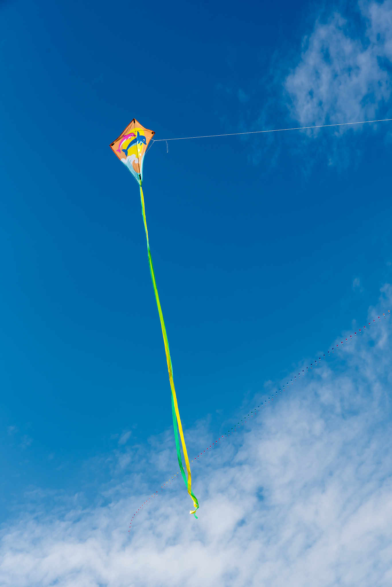 kites with blue sky and white clouds