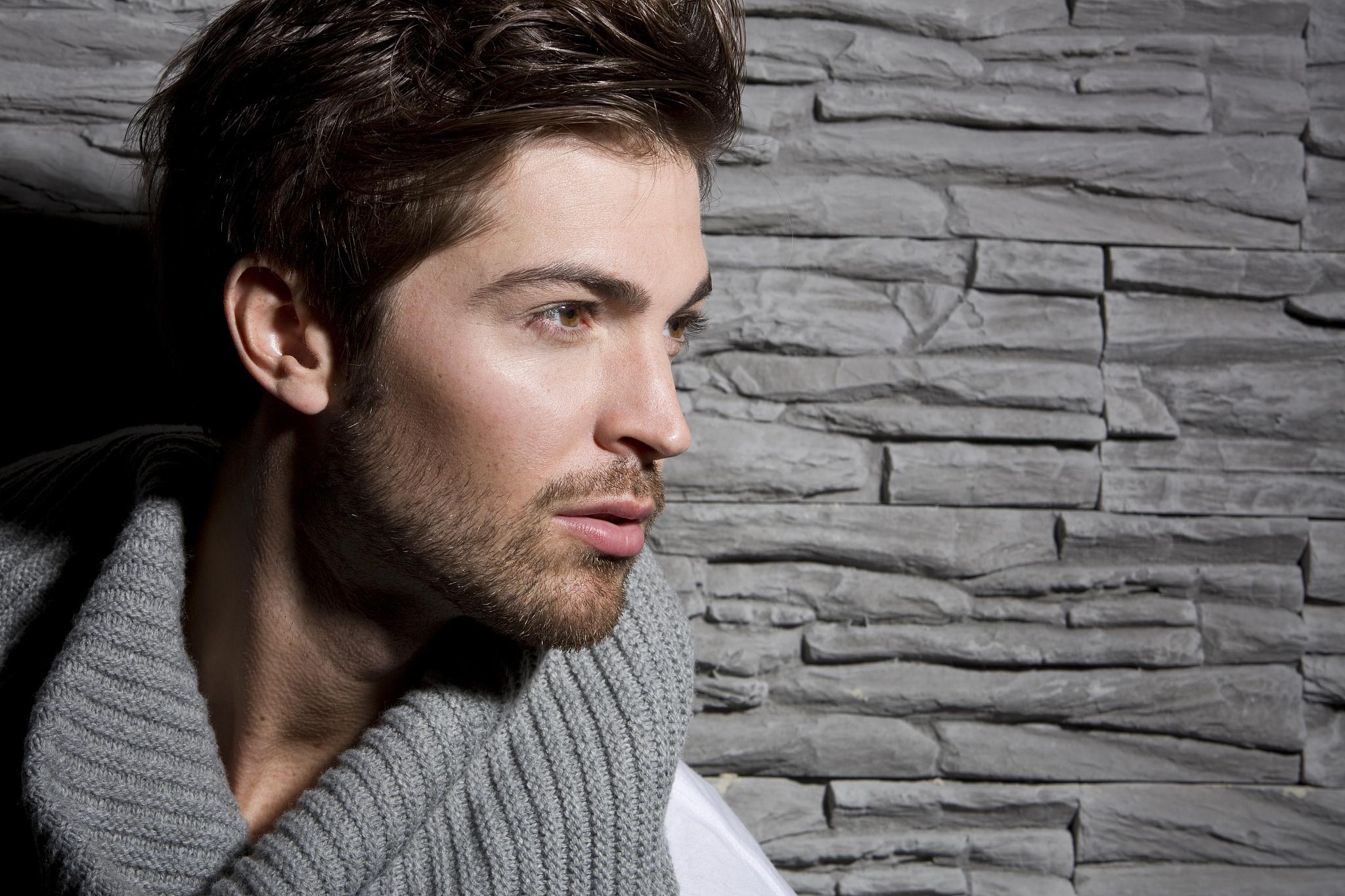 attractive young man wearing woolen scarf