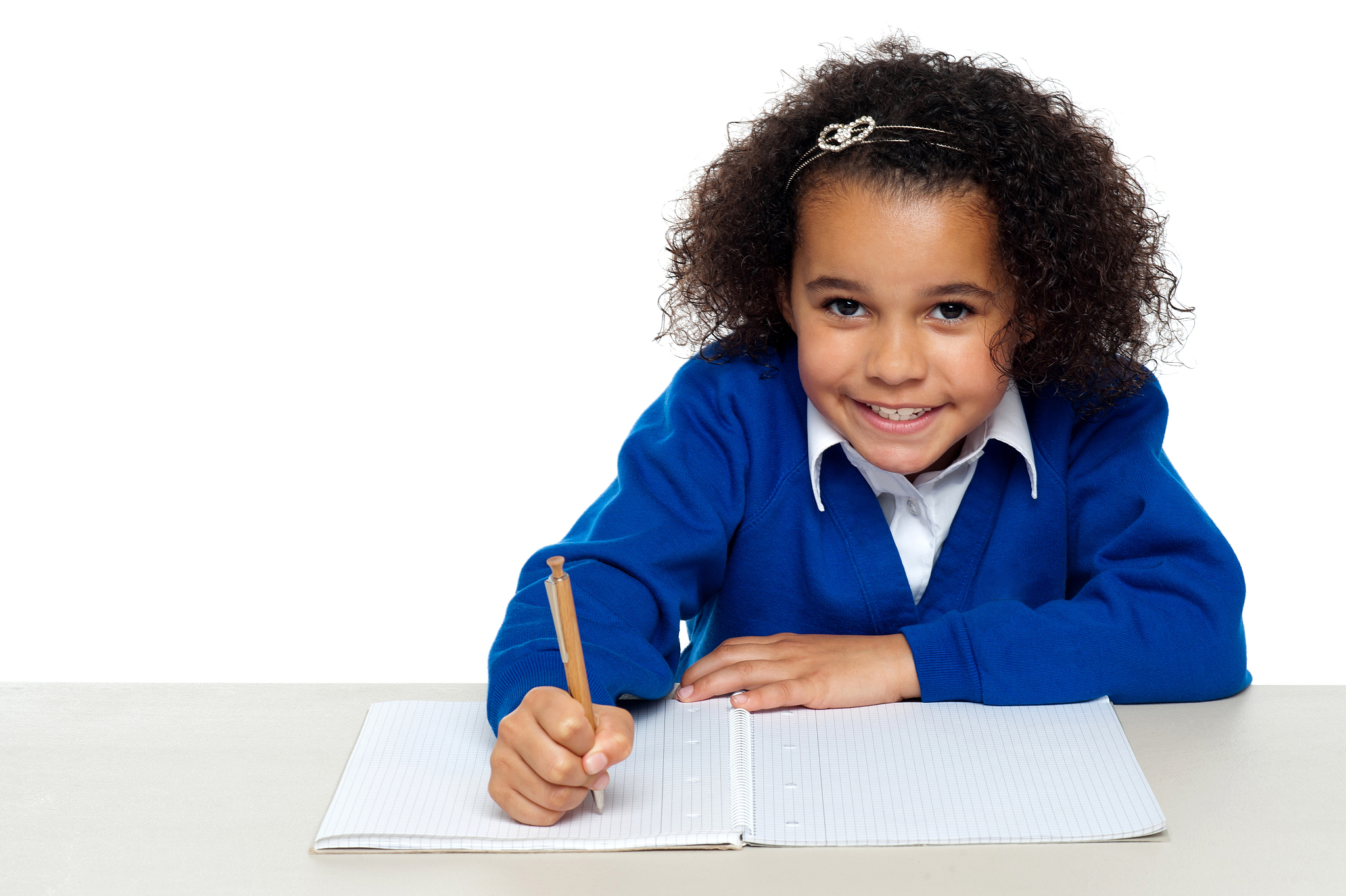 cute primary kid writing her assignment