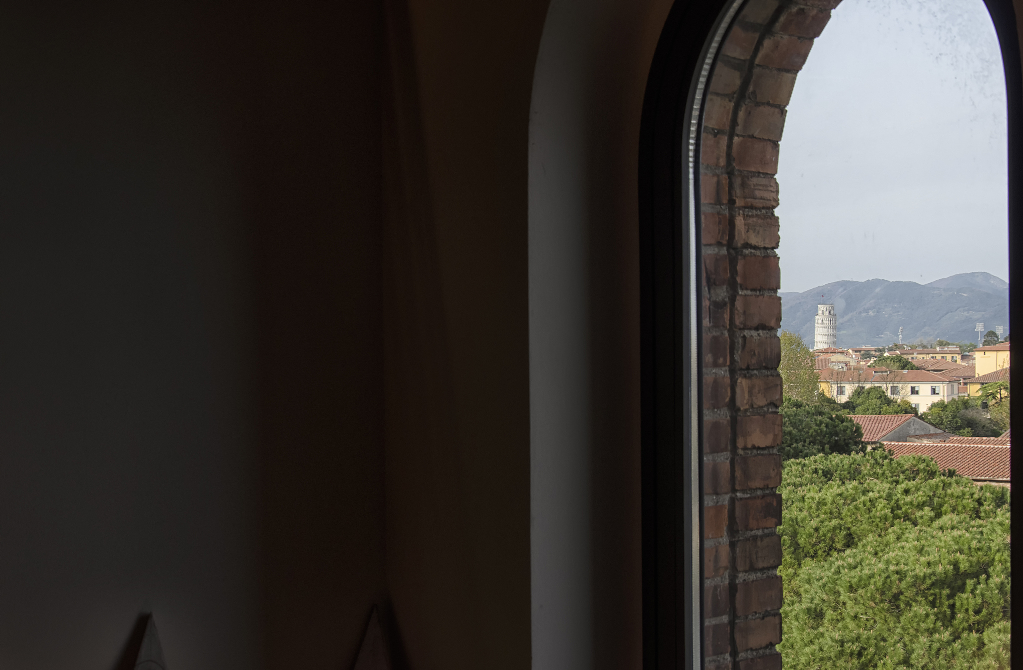 the tower of pisa from inside a building