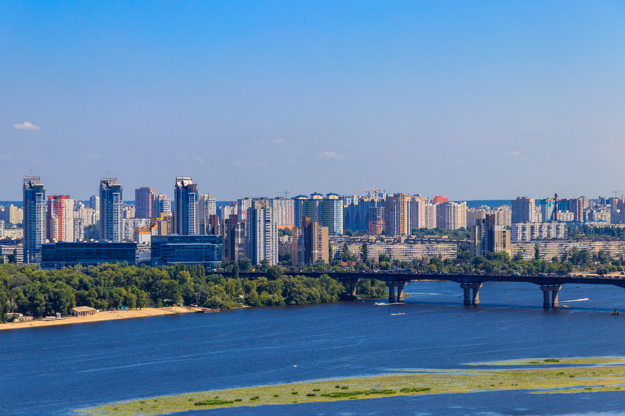 view of paton bridge and left bank of the dnieper river in kiev,