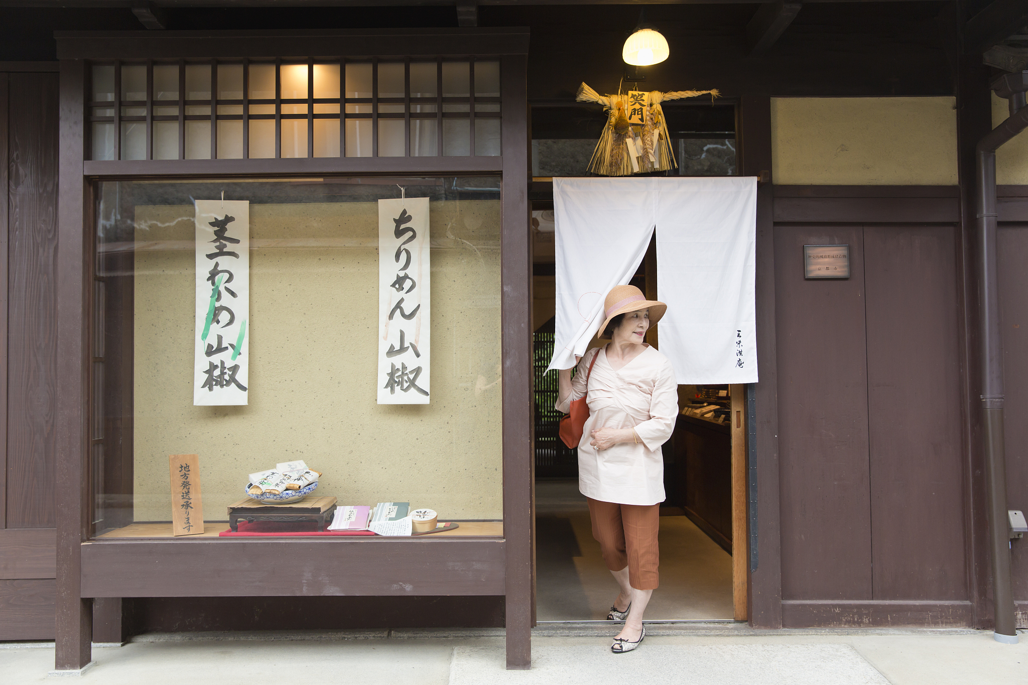 senior woman left shop