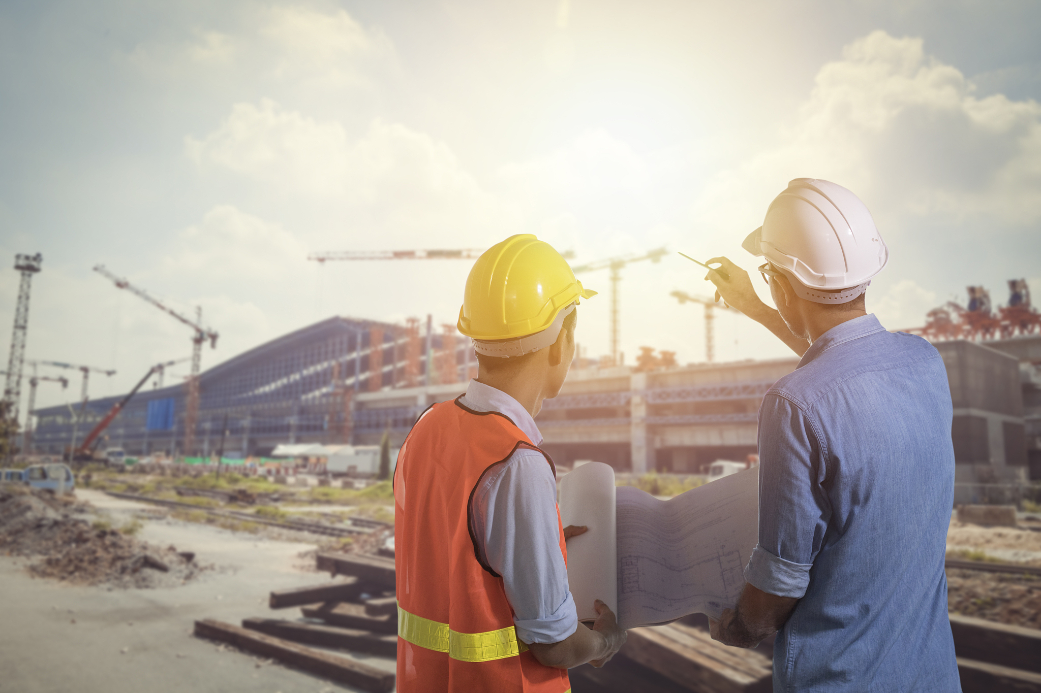 engineer on construction site planning and  analyzing about cons