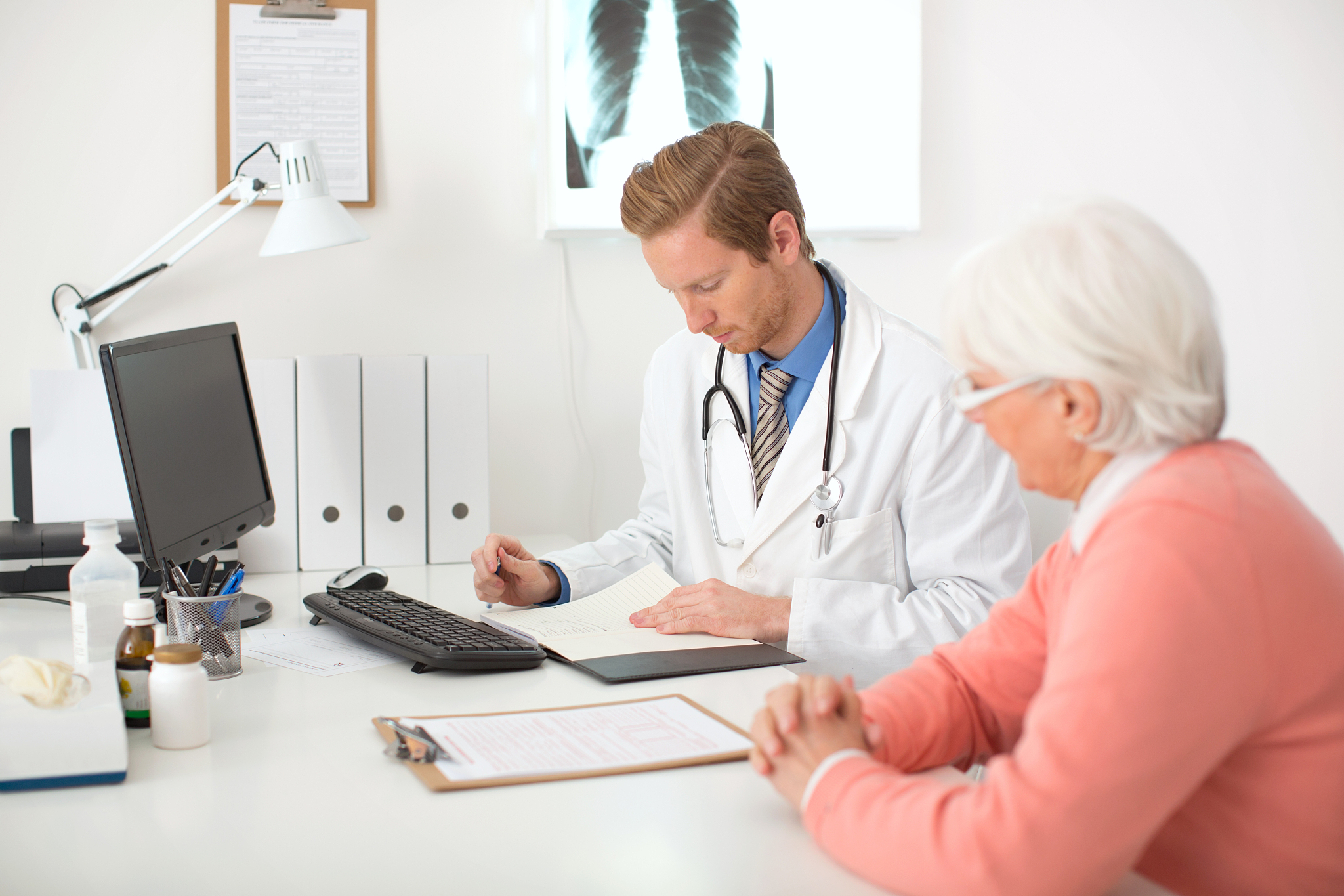senior woman visiting doctor.