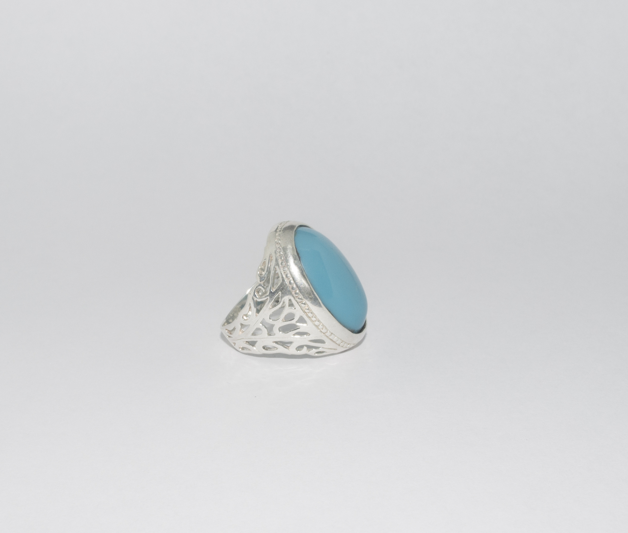The Cushion Green Marble is a classic signet ring handset with a custom cut stone of Green Marble in a sleek bezel Green marble is believed to provide clarity self-control and stability both physicall