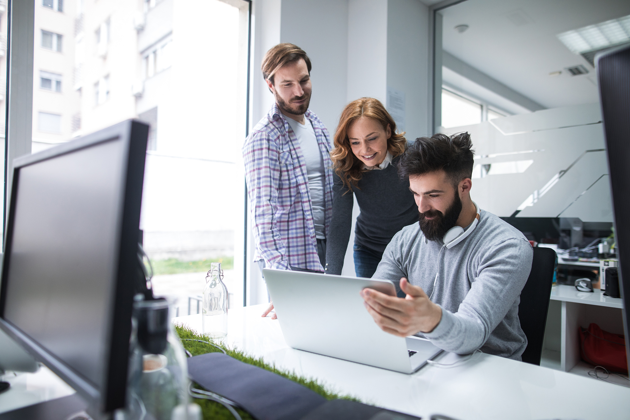 web designers working in office on a project together