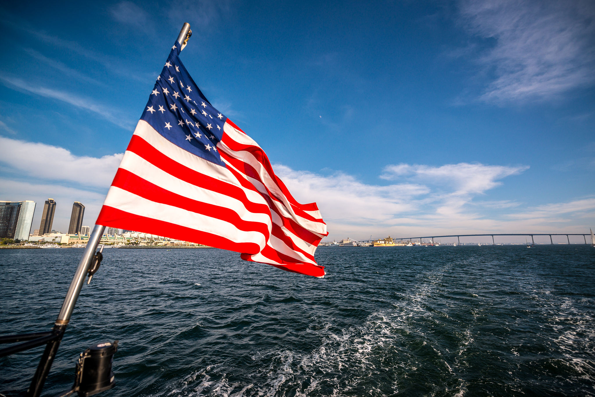 us flag on a ferry from coronado to san diego, ca, usa