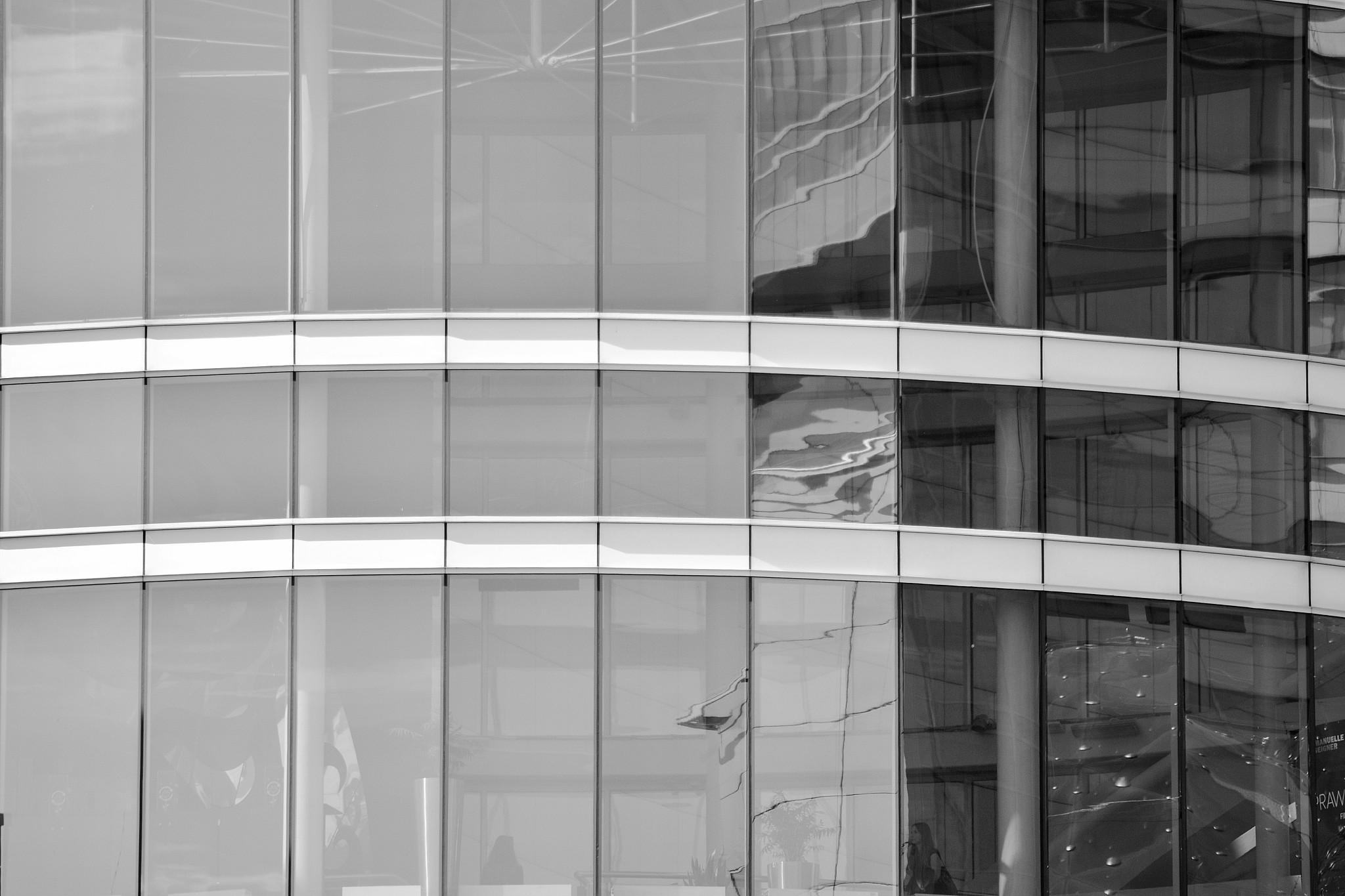 modern office building wall made of steel and glass. black and w
