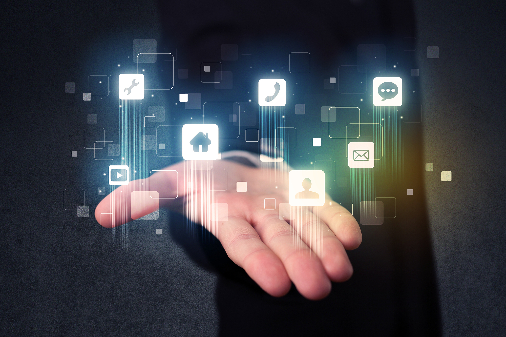 businessman holding blue applications