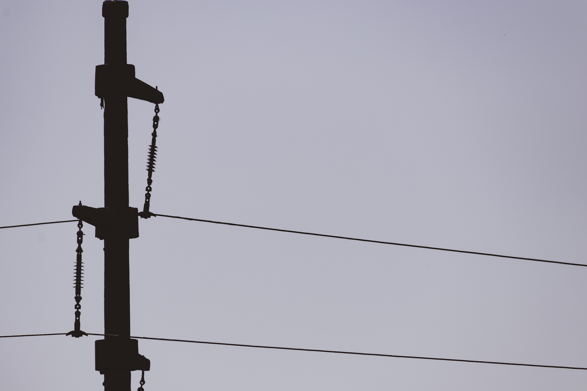 closeup of power lines on power pole