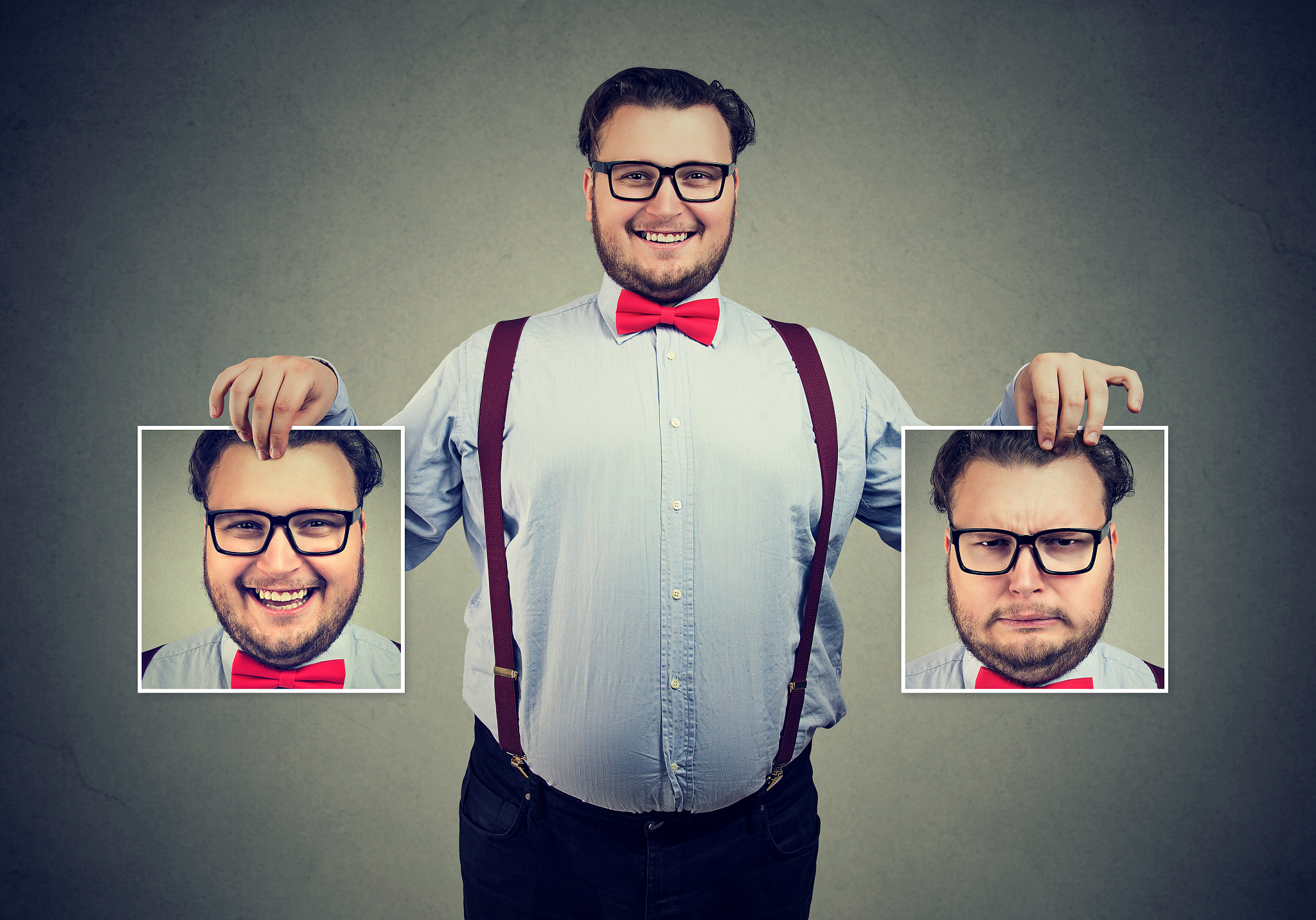 cheerful man showing different photos with emotions