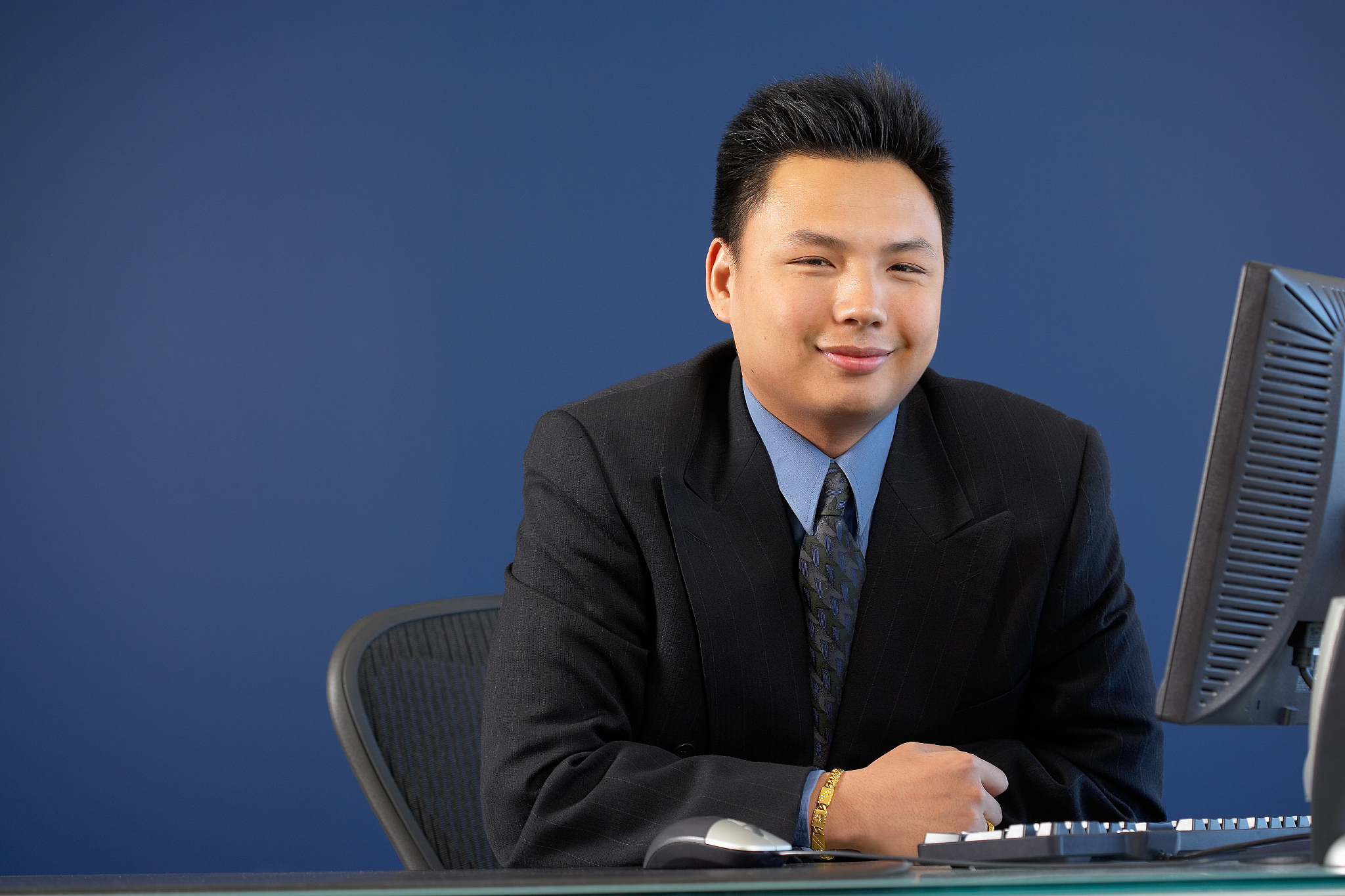 portrait of businessman at desk