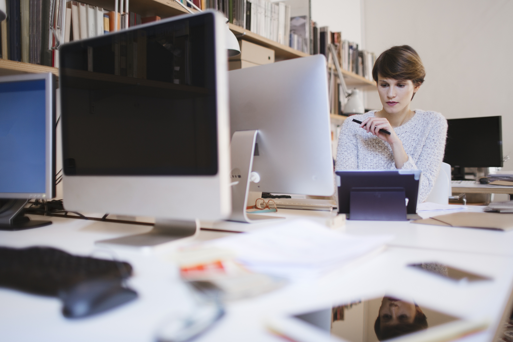 business woman working in small  office, barcelona.