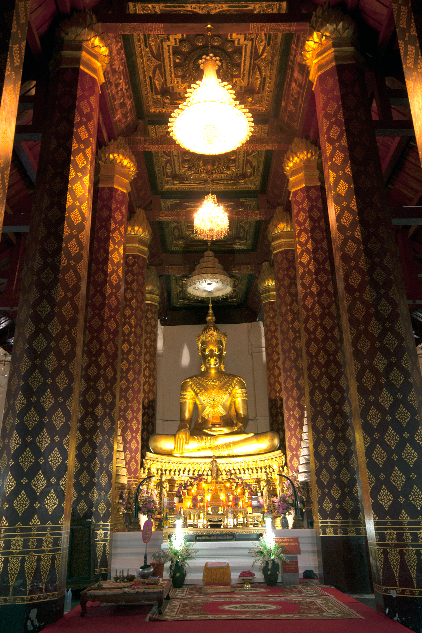 golden buddha image in a temple.