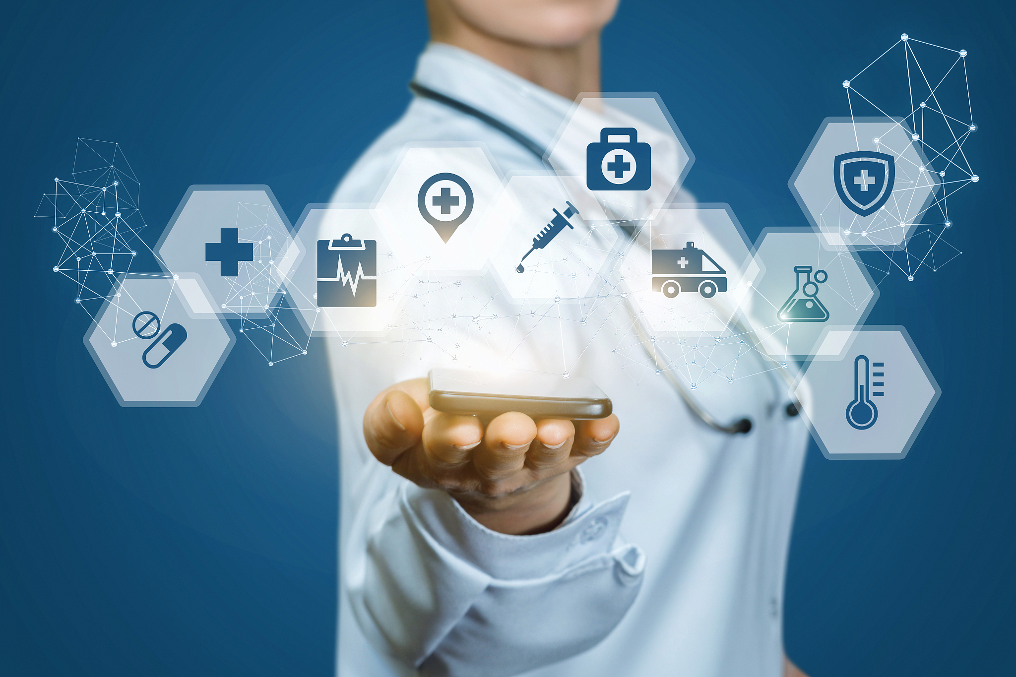 doctor shows icons of medical care .