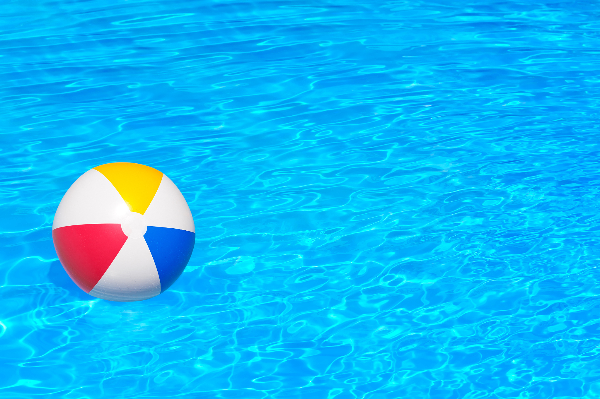 inflatable ball in swimming pool