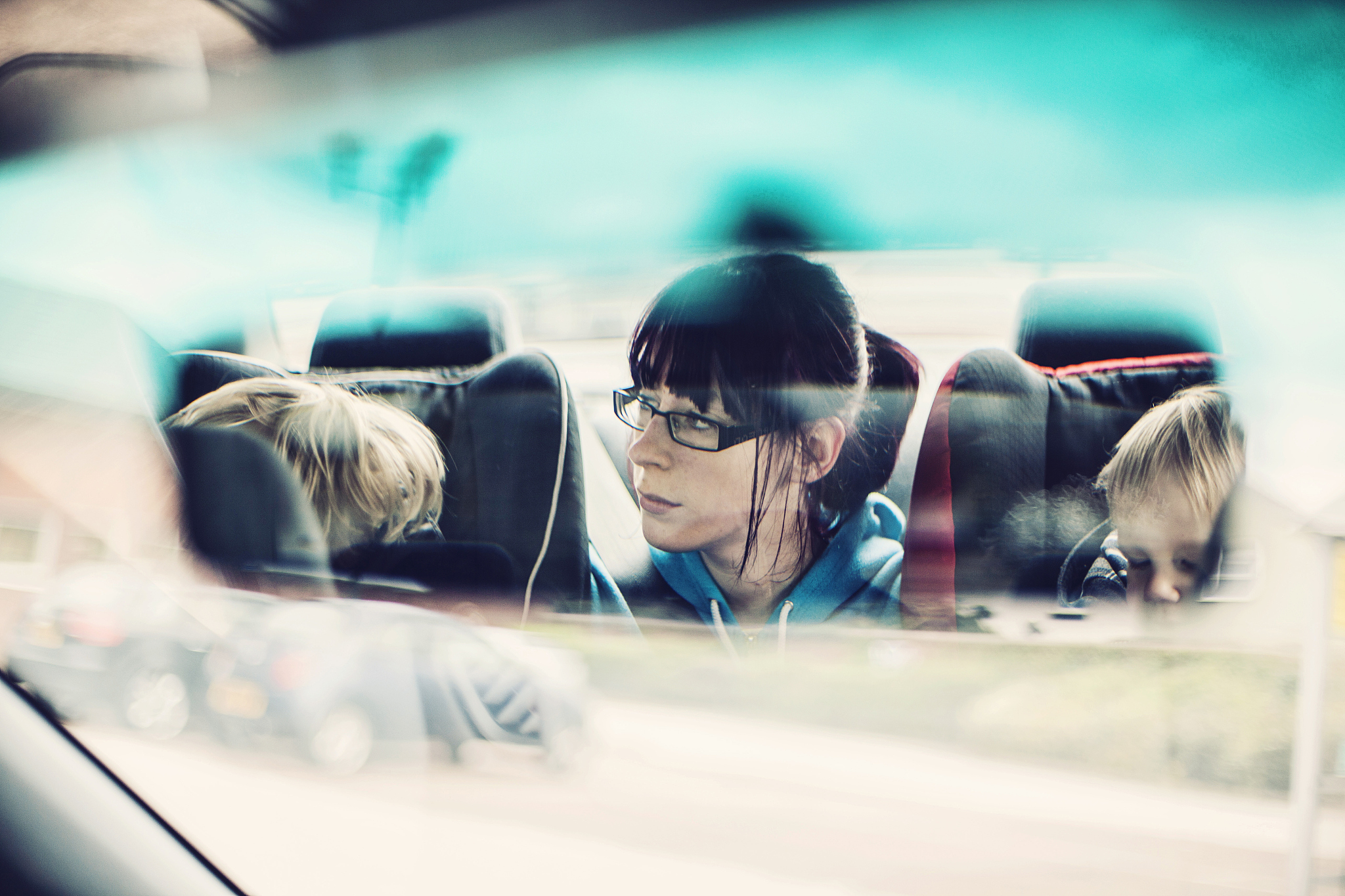 children sat in car