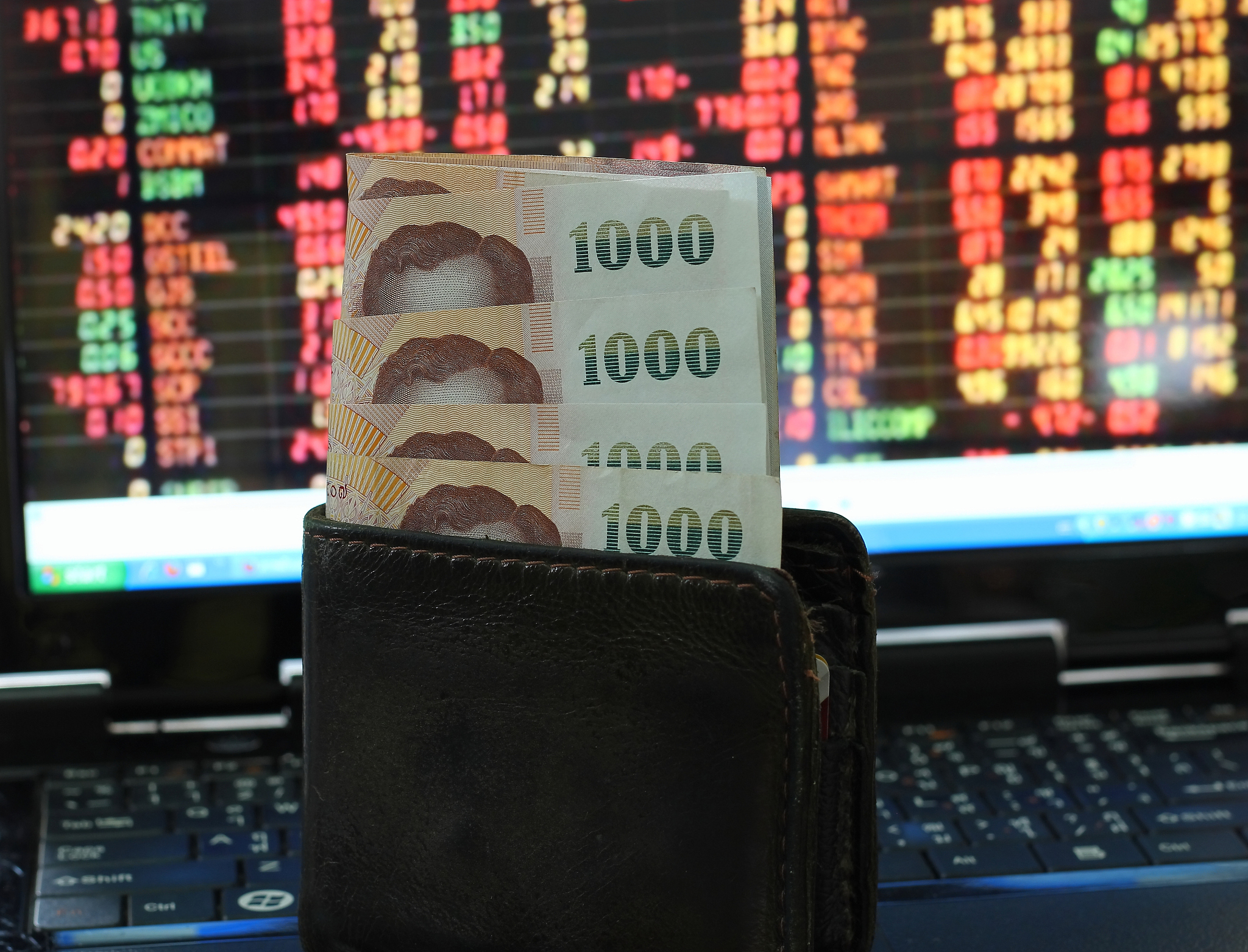pockets money on board stock background