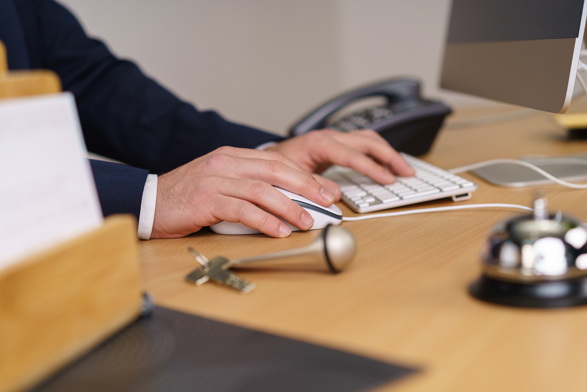 manager or male receptionist working in a hotel