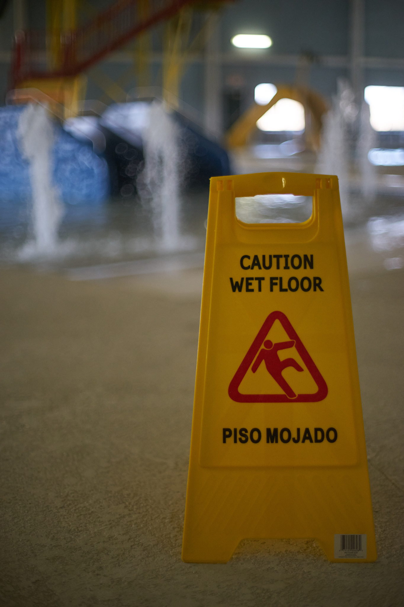 caution wet floor sign in factory