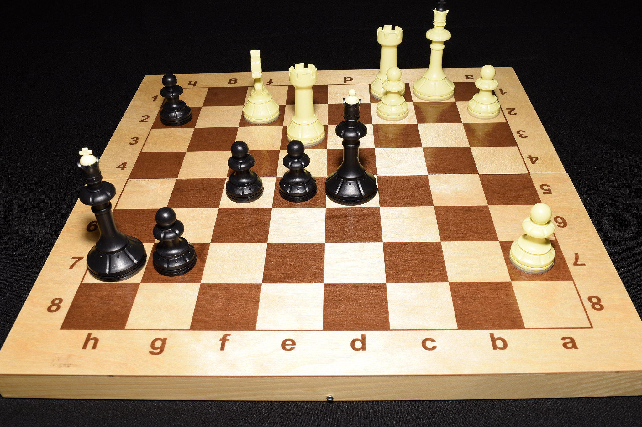 chess board with black pieces like a strategy backdrop