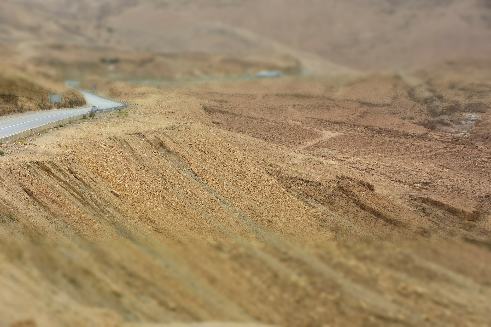 a winding road on the way to the dead sea
