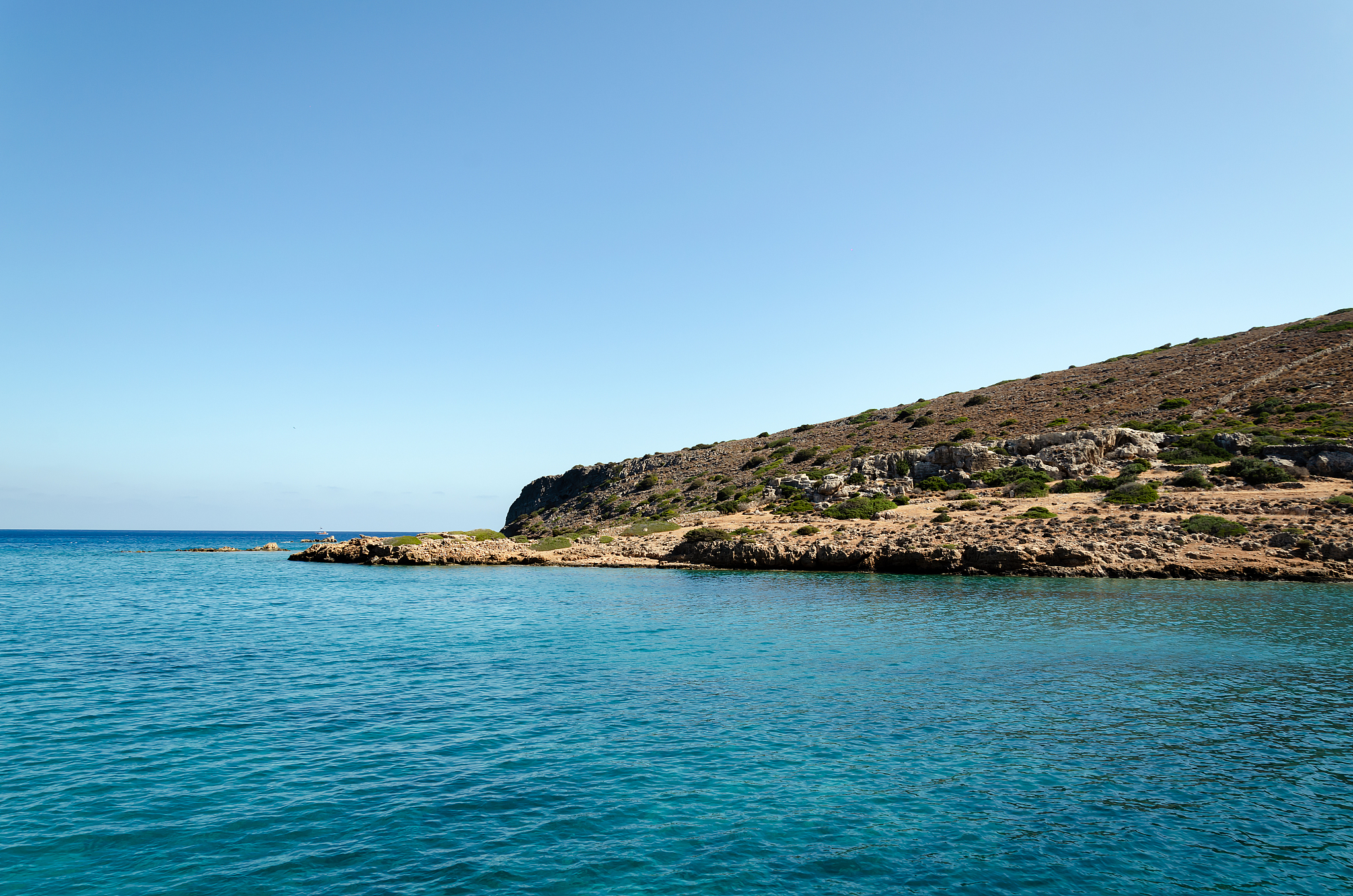 sea view, with clear water and blue sky, greece