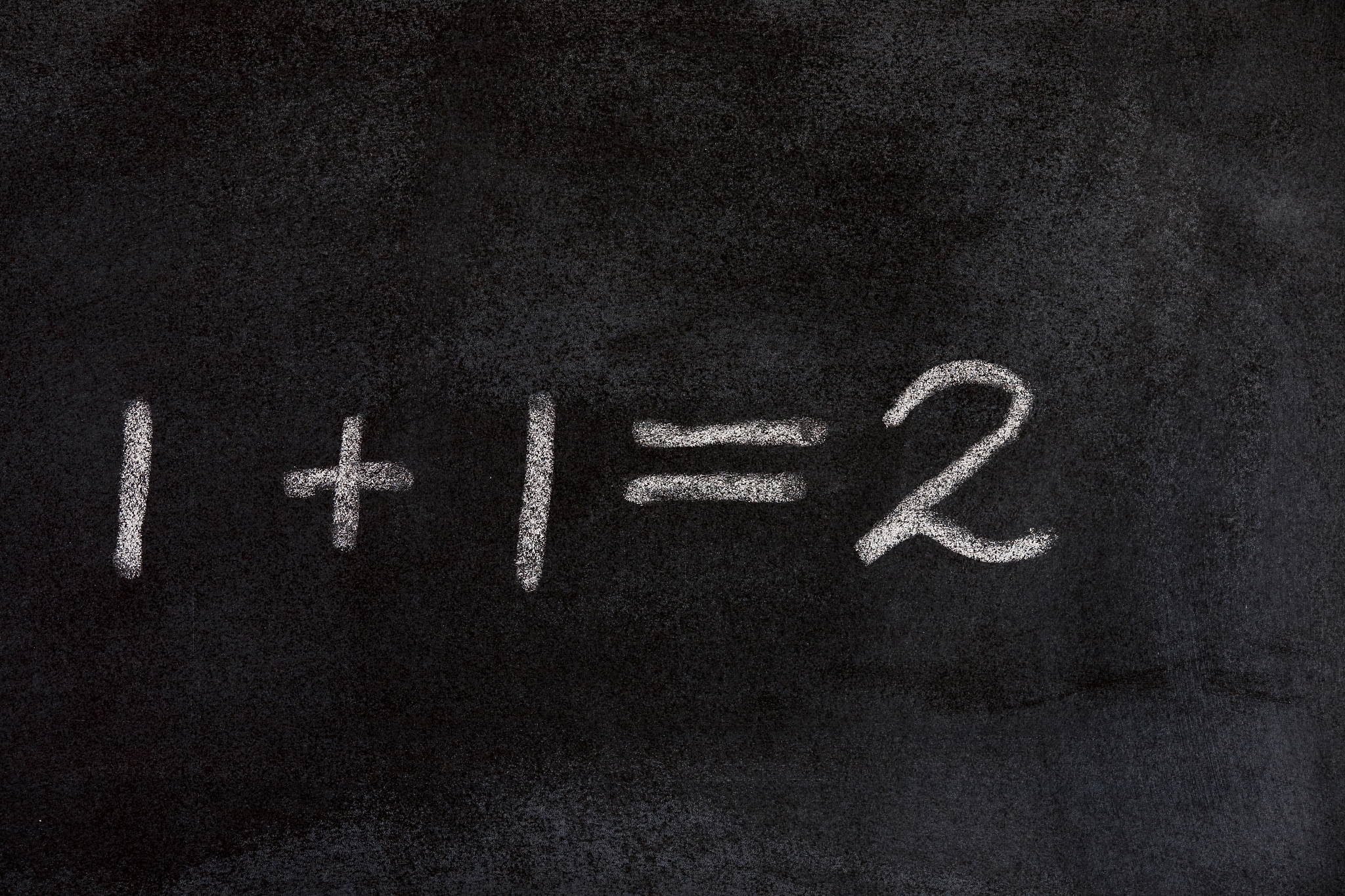 1+1为什么等于2请从数学家的角度告诉我