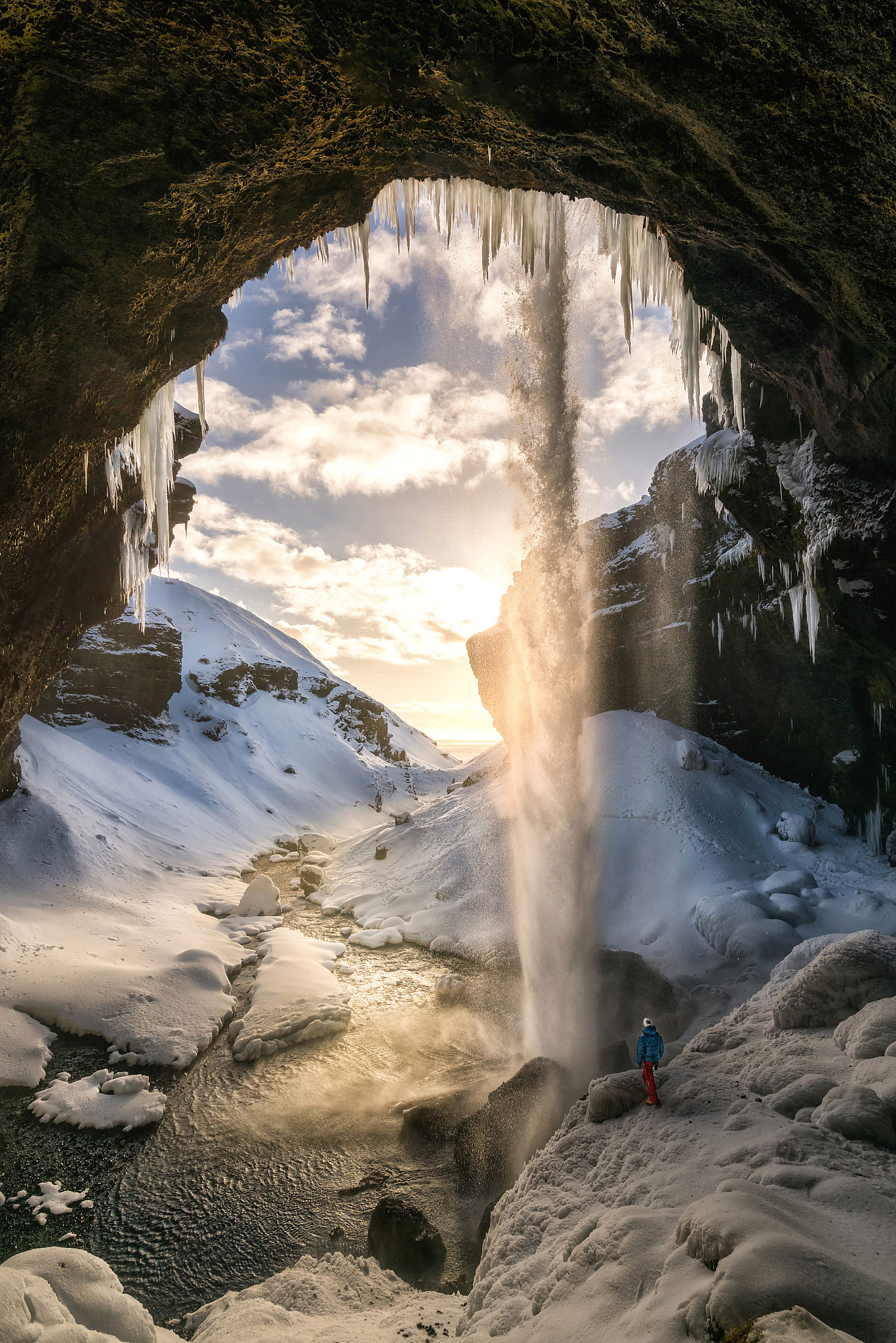 man standing in cave