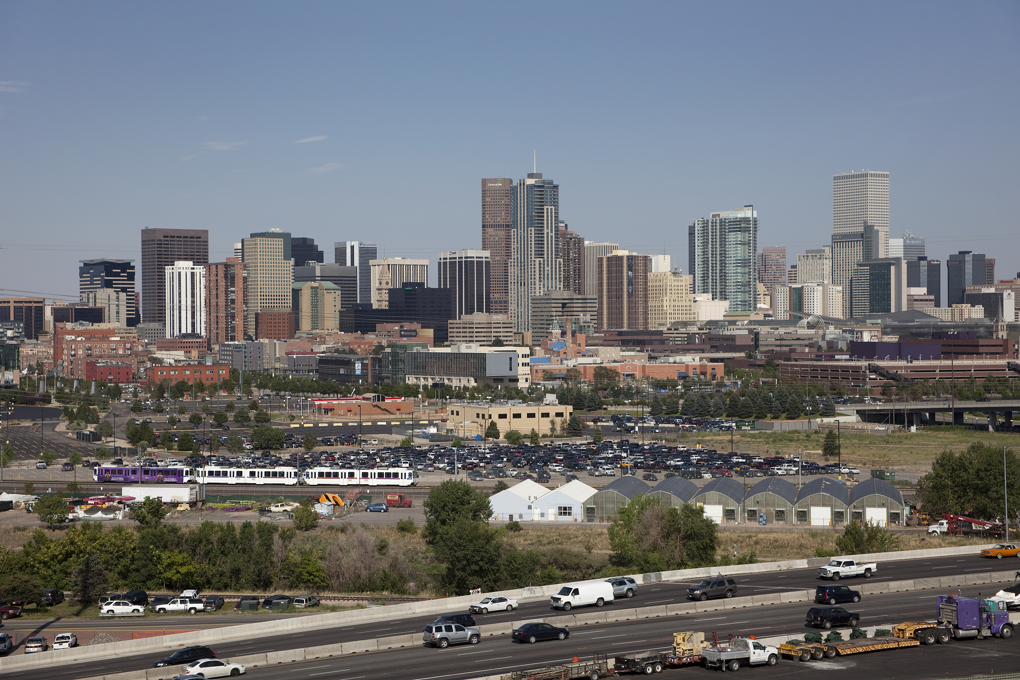 downtown denver colorado skyline light rail and interstate