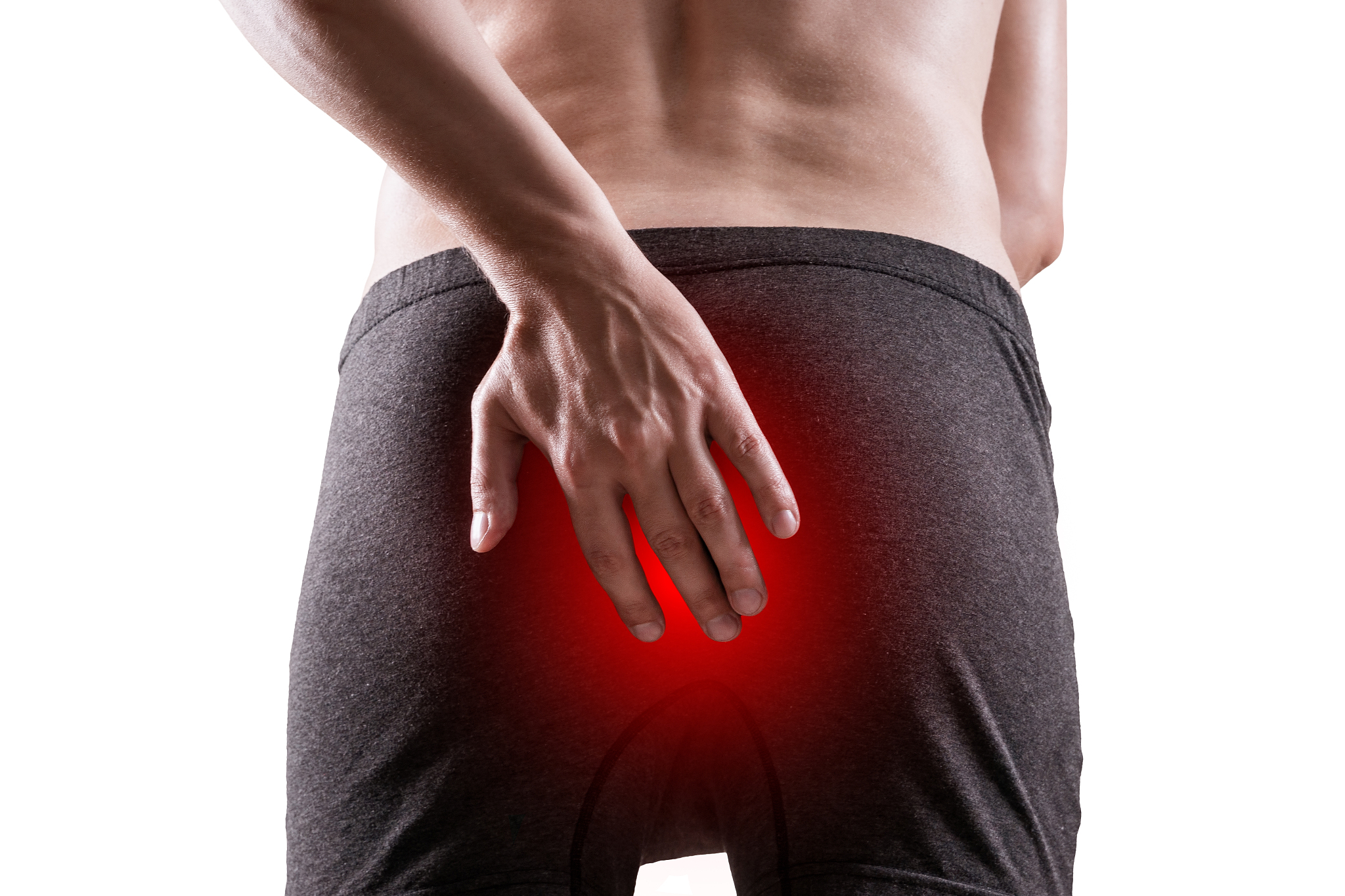 man suffering from hemorrhoids, anal pain, isolated on white bac