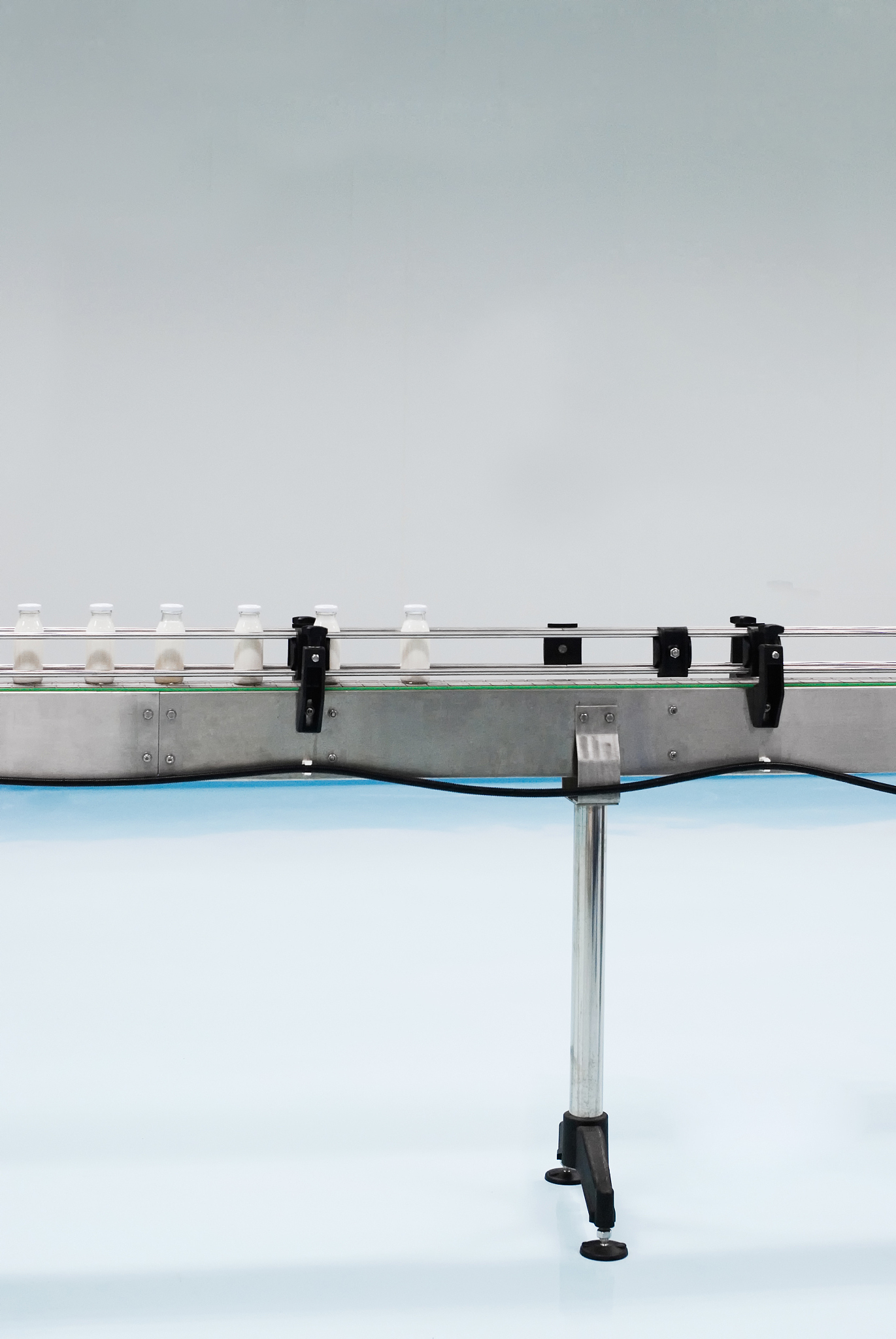 glass bottles on the conveyor belt