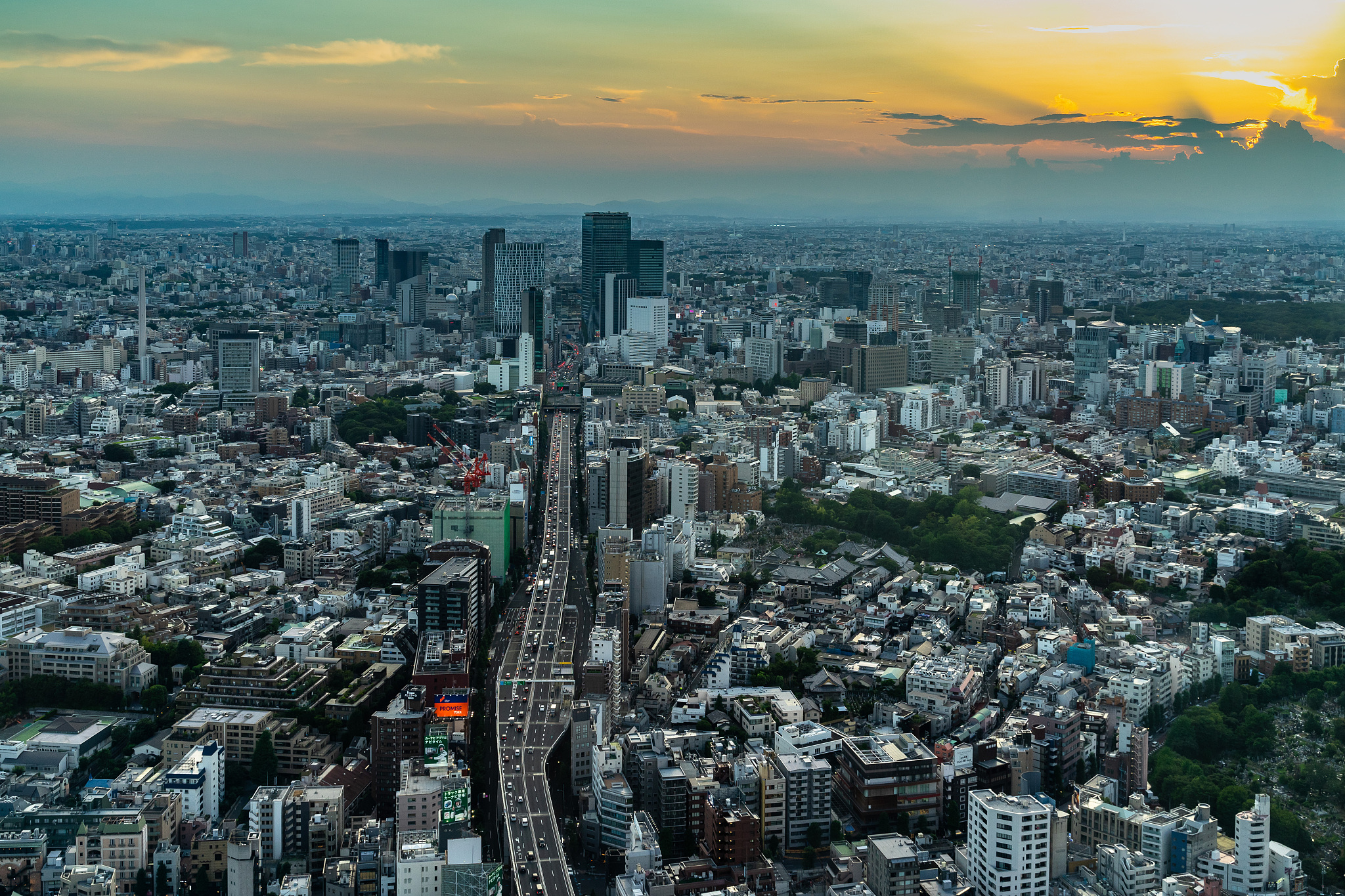 tokyo skyline and skyscrapers at sunset viewed from mori tower o