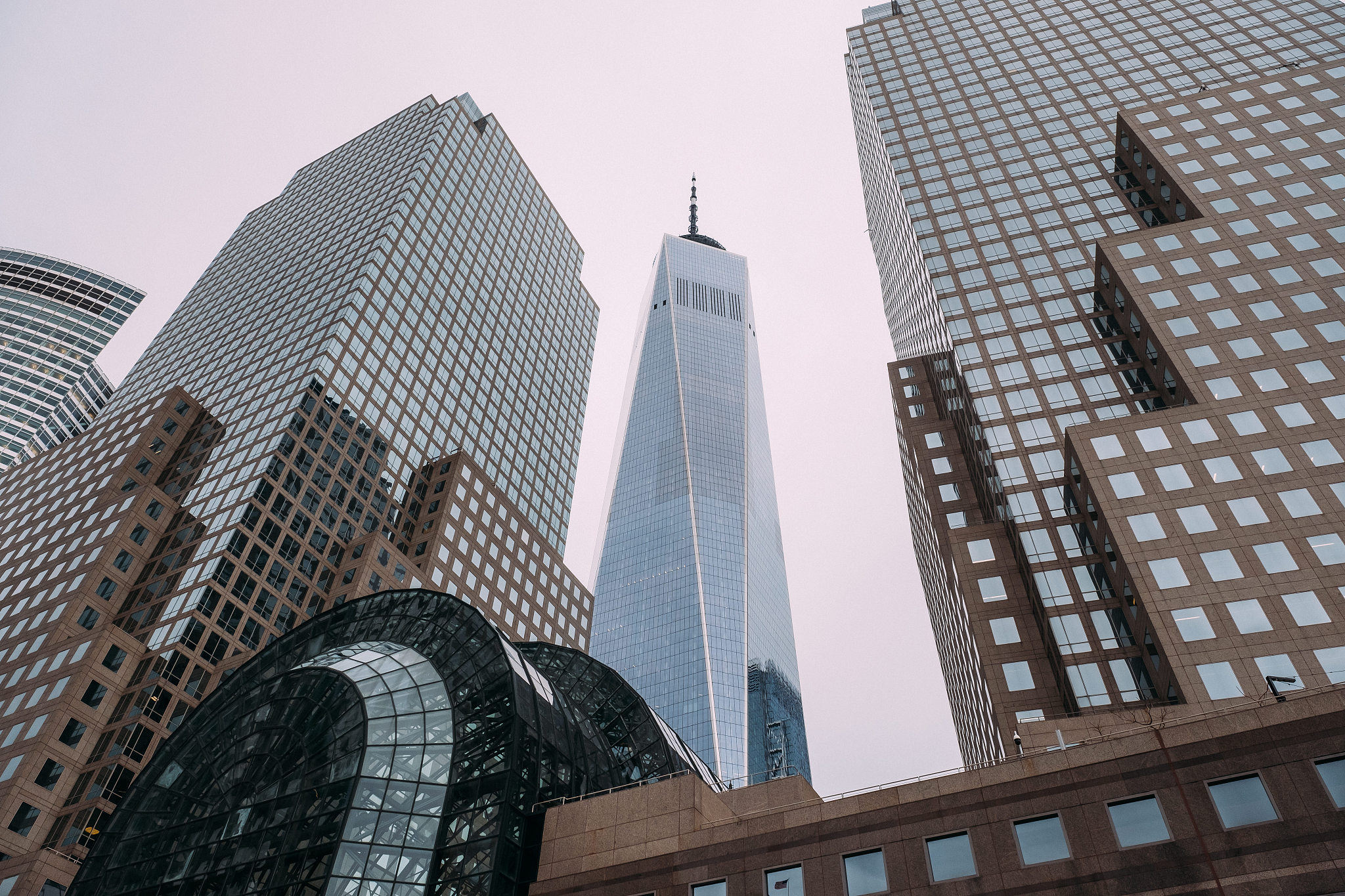 the facade of the modern glass buildings of the financial distri