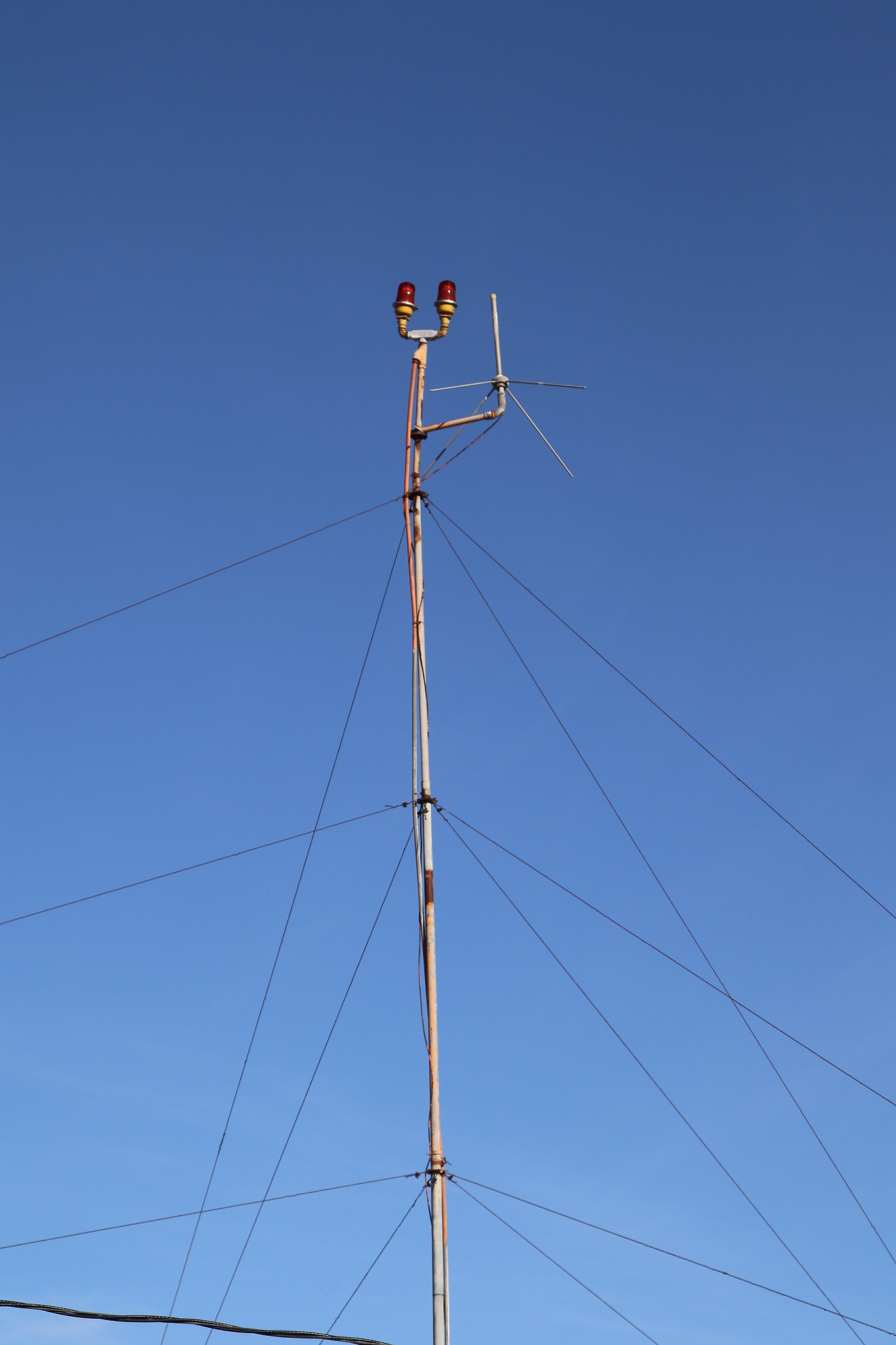 low angle view of pole against clear blue sky