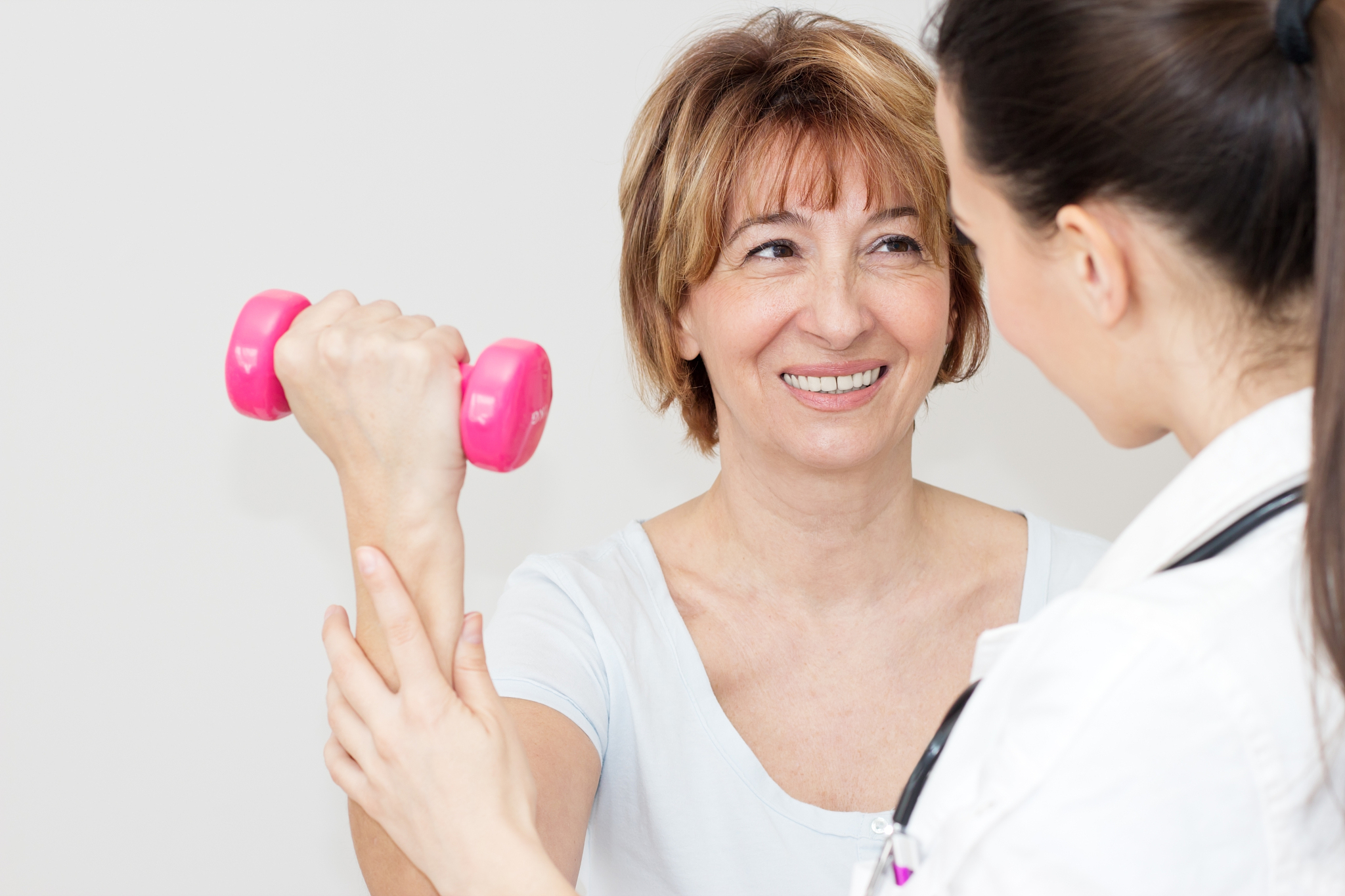 middle age woman having physical therapy